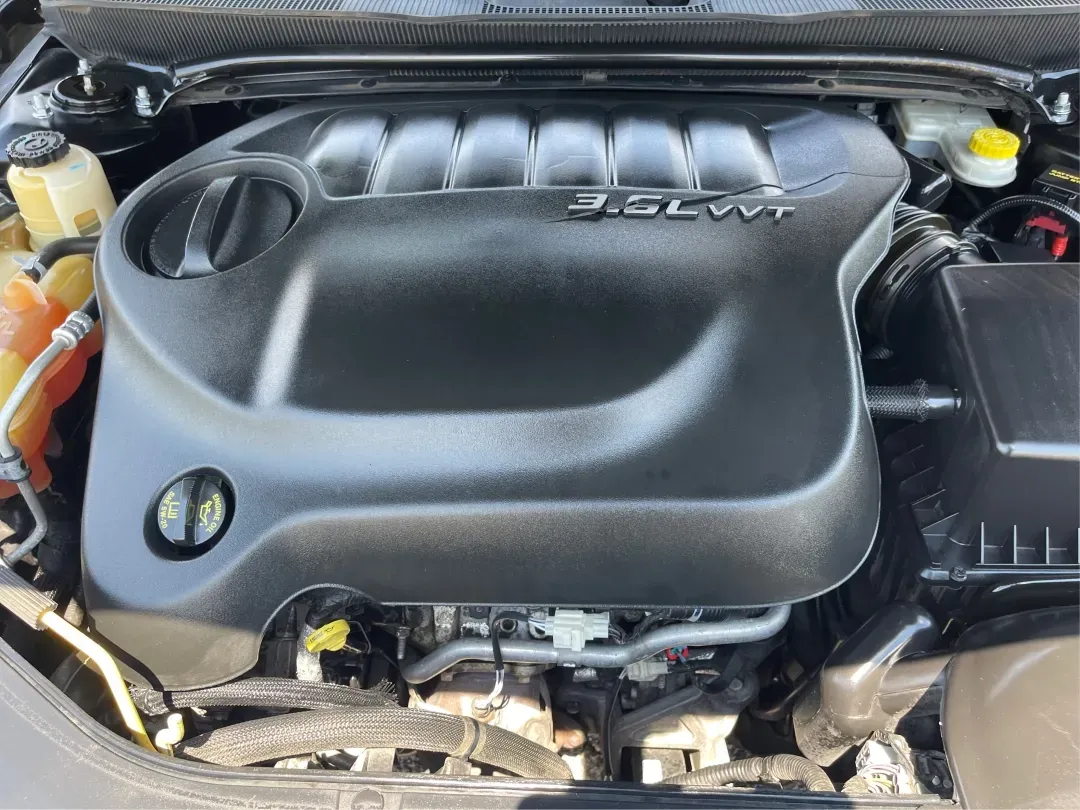 2014 Chrysler 200 LX (1C3CCBAG7EN) with an Other engine, located at 1230 East Main St, Xenia, OH, 45385, (937) 908-9800, 39.688026, -83.910172 - Are you looking for a reliable car that seamlessly fits into your busy lifestyle? Look no further than this stunning 2014 Chrysler 200 LX, available now at Advantage Car and Credit in Fairborn, OH. This stylish sedan is perfect for growing families, daily commuters, or anyone seeking a dependable ve - Photo#11