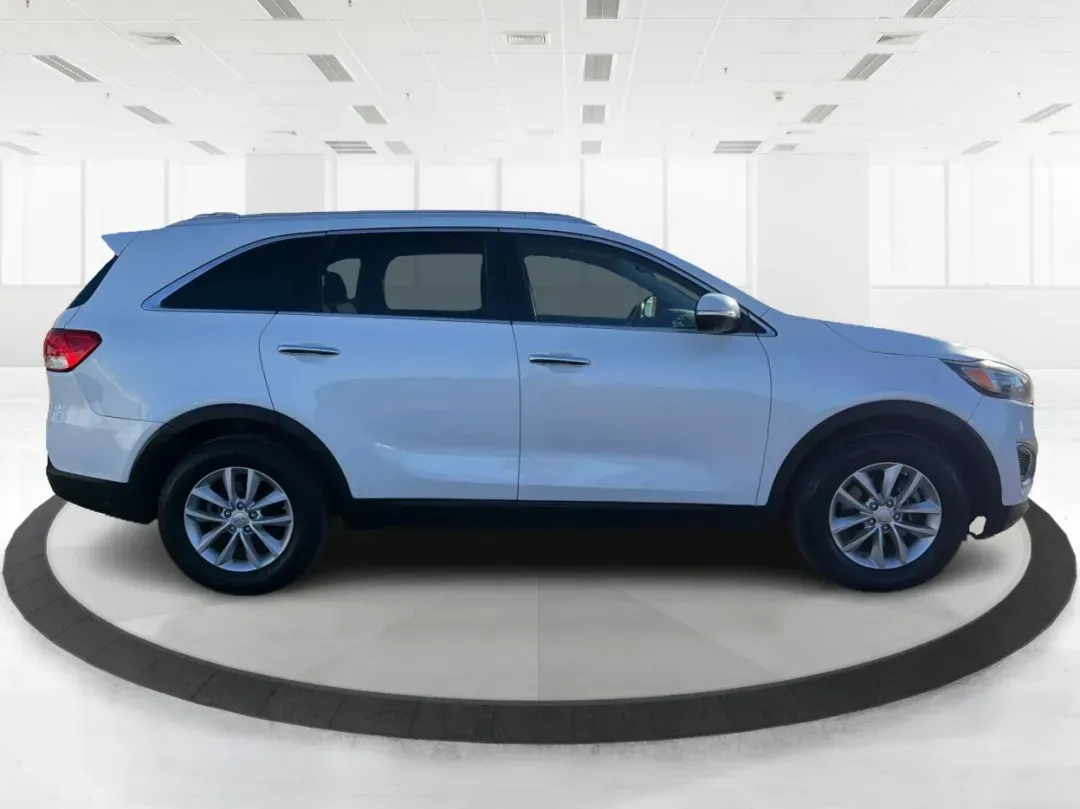 2016 Kia Sorento 2.4L LX (5XYPG4A39GG) with an 2.4L I-4 gasoline direct injection engine, located at 4508 South Dixie Dr, Moraine, OH, 45439, (937) 908-9800, 39.689976, -84.218452 - 2016 Kia Sorento 2.4L LX - Photo#1