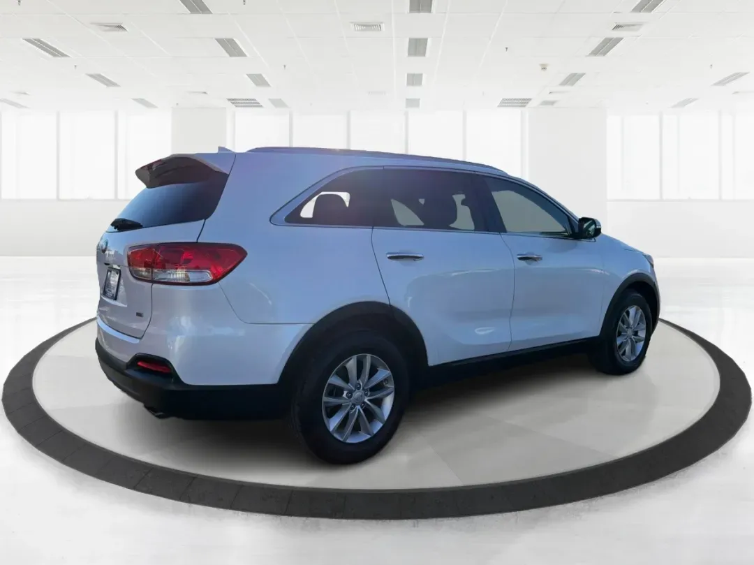 2016 Kia Sorento 2.4L LX (5XYPG4A39GG) with an 2.4L I-4 gasoline direct injection engine, located at 4508 South Dixie Dr, Moraine, OH, 45439, (937) 908-9800, 39.689976, -84.218452 - 2016 Kia Sorento 2.4L LX - Photo#2