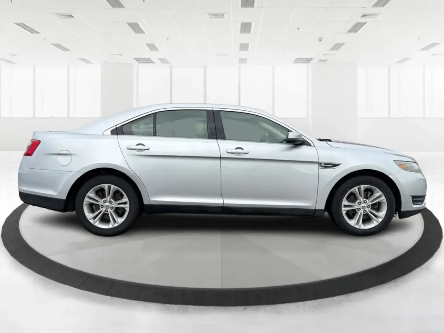 2013 Ford Taurus SEL (1FAHP2H87DG) with an 3.5L V-6 DOHC engine, 6-Speed Automatic transmission, located at 1099 N County Rd 25A, Troy, OH, 45373, (937) 908-9800, 40.057079, -84.212883 - **Discover the Perfect Family Sedan: 2013 Ford Taurus SEL at Advantage Car and Credit - Piqua, OH**<br /> <br /> Are you searching for a reliable and spacious vehicle that fits seamlessly into your family's lifestyle? Look no further than this 2013 Ford Taurus SEL, available now at Advantage Car and - Photo#1