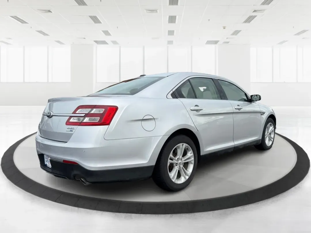 2013 Ford Taurus SEL (1FAHP2H87DG) with an 3.5L V-6 DOHC engine, located at 8750 N County Rd 25A, Piqua, OH, 45356, (937) 908-9800, 40.164391, -84.232513 - 2013 Ford Taurus SEL - Photo#2