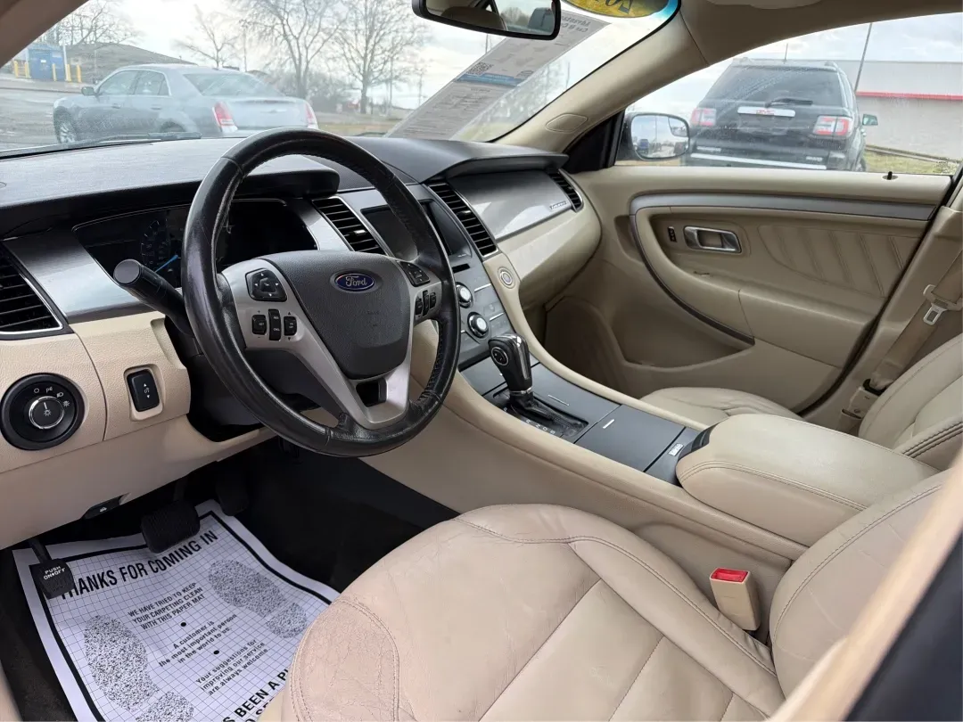 2013 Ford Taurus SEL (1FAHP2H87DG) with an 3.5L V-6 DOHC engine, located at 8750 N County Rd 25A, Piqua, OH, 45356, (937) 908-9800, 40.164391, -84.232513 - 2013 Ford Taurus SEL - Photo#9