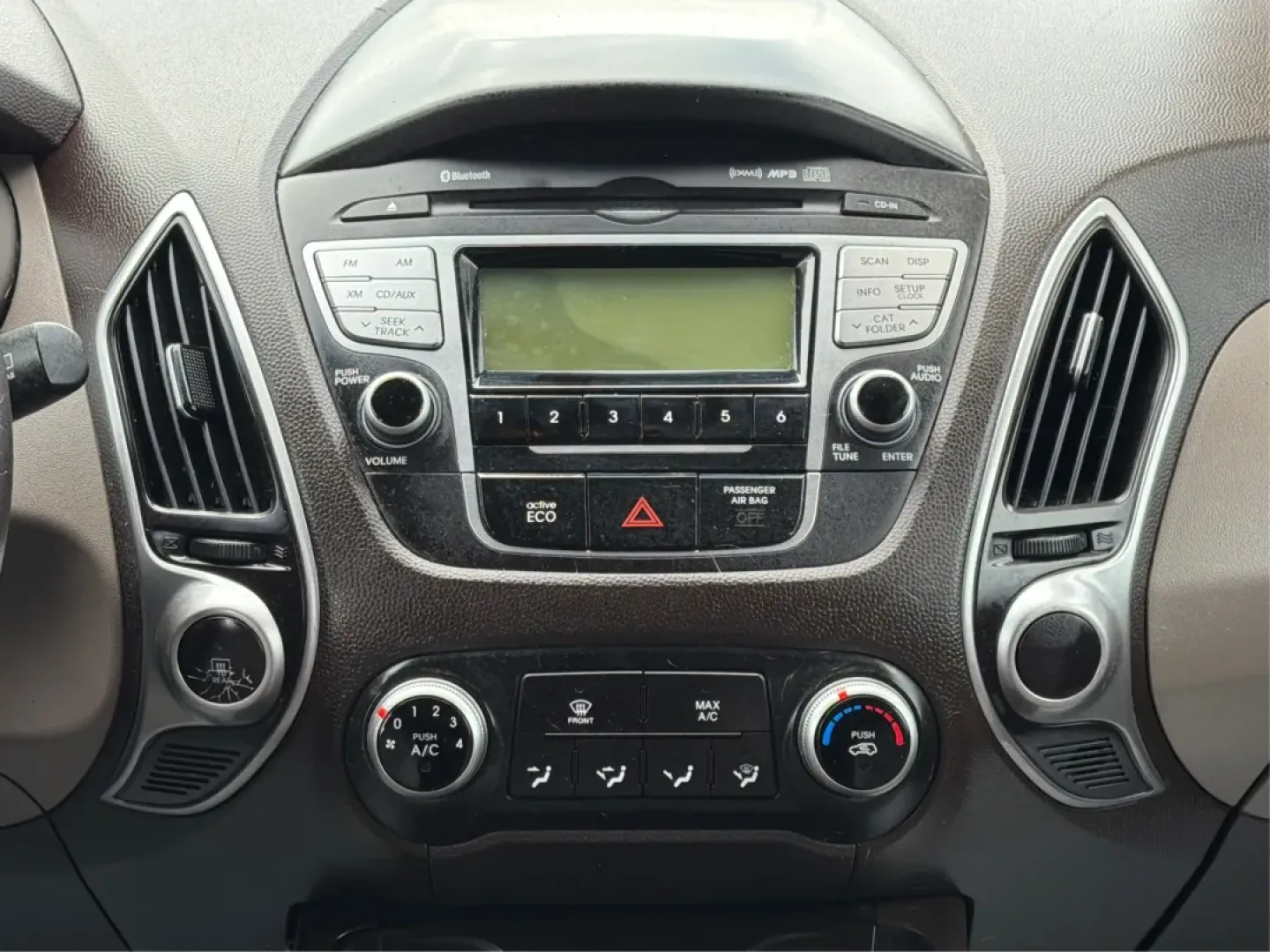 2012 Hyundai Tucson GLS (KM8JU3AC7CU) with an Theta II 2.4L I-4 DOHC engine, located at 8750 N County Rd 25A, Piqua, OH, 45356, (937) 908-9800, 40.164391, -84.232513 - **Discover the Perfect Family Adventure Vehicle: 2012 Hyundai Tucson GLS at Advantage Car and Credit - Piqua**<br /> <br /> Are you on the hunt for a versatile SUV that fits seamlessly into your active lifestyle? Look no further than this stunning 2012 Hyundai Tucson GLS at Advantage Car and Credit - Photo#13