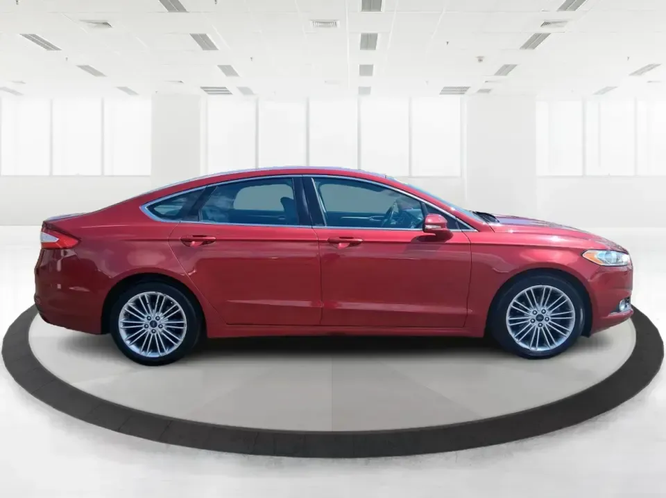 2016 Ford Fusion SE (3FA6P0HD7GR) with an 1.5L L4 DOHC 16V engine, 6-Speed Automatic transmission, located at 1099 N County Rd 25A, Troy, OH, 45373, (937) 908-9800, 40.057079, -84.212883 - Experience the perfect blend of style, comfort, and reliability with this 2016 Ford Fusion SE, available now at Advantage Car and Credit in Fairborn, OH. Whether you're a commuter navigating the busy streets of downtown Fairborn or a growing family looking for a dependable vehicle for your weekend a - Photo#1