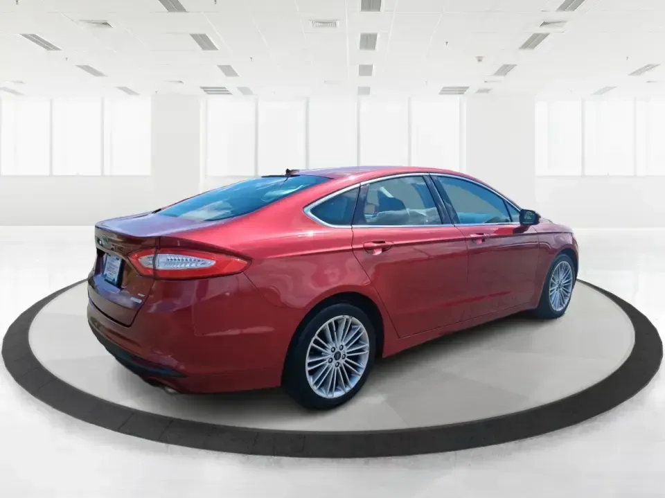 2016 Ford Fusion SE (3FA6P0HD7GR) with an 1.5L L4 DOHC 16V engine, 6-Speed Automatic transmission, located at 1099 N County Rd 25A, Troy, OH, 45373, (937) 908-9800, 40.057079, -84.212883 - Experience the perfect blend of style, comfort, and reliability with this 2016 Ford Fusion SE, available now at Advantage Car and Credit in Fairborn, OH. Whether you're a commuter navigating the busy streets of downtown Fairborn or a growing family looking for a dependable vehicle for your weekend a - Photo#2