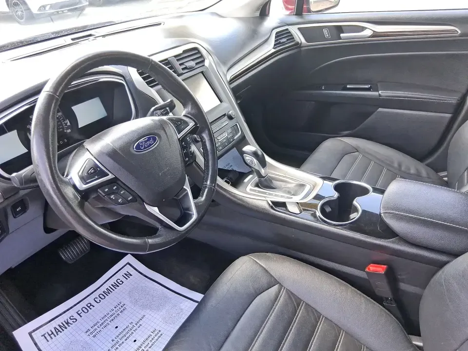 2016 Ford Fusion SE (3FA6P0HD7GR) with an 1.5L L4 DOHC 16V engine, 6-Speed Automatic transmission, located at 1099 N County Rd 25A, Troy, OH, 45373, (937) 908-9800, 40.057079, -84.212883 - Experience the perfect blend of style, comfort, and reliability with this 2016 Ford Fusion SE, available now at Advantage Car and Credit in Fairborn, OH. Whether you're a commuter navigating the busy streets of downtown Fairborn or a growing family looking for a dependable vehicle for your weekend a - Photo#9