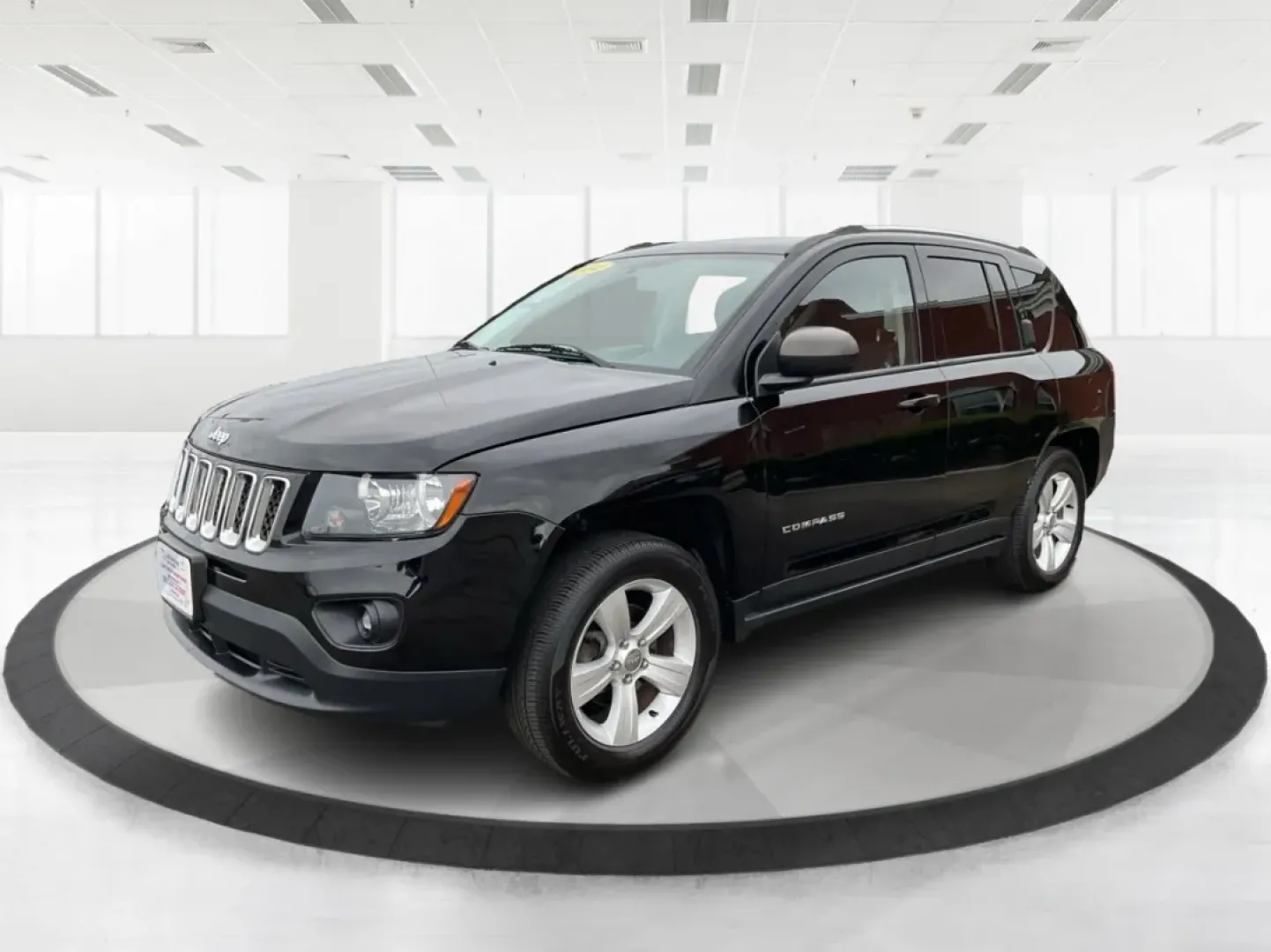 2014 Jeep Compass Sport (1C4NJDBBXED) with an 2.4L I-4 DOHC engine, located at 1951 S Dayton Lakeview Rd., New Carlisle, OH, 45344, (937) 908-9800, 39.890999, -84.050255 - Experience the thrill of adventure and the comfort of a reliable ride with this stunning 2014 Jeep Compass Sport, available now at Advantage Car and Credit in New Carlisle, OH. Perfect for weekend getaways or daily commutes, this versatile SUV balances style, performance, and practicality, making it - Photo#8