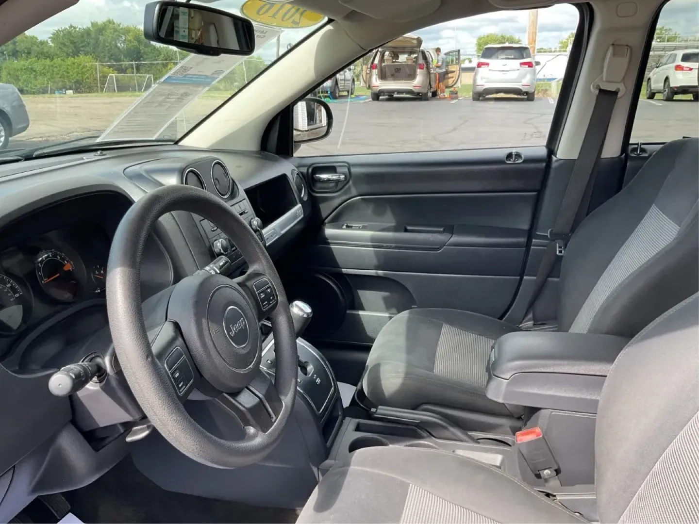 2016 Jeep Compass Sport (1C4NJDBB8GD) with an 2.4L I-4 DOHC engine, located at 1230 East Main St, Xenia, OH, 45385, (937) 908-9800, 39.688026, -83.910172 - **Unleash Your Adventurous Spirit with the 2016 Jeep Compass Sport Perfect for Weekend Getaways!**<br /> <br /> Are you ready to elevate your outdoor adventures? The 2016 Jeep Compass Sport is your ticket to exploring the rugged terrains while keeping comfort and style at the forefront. Perfect for - Photo#9