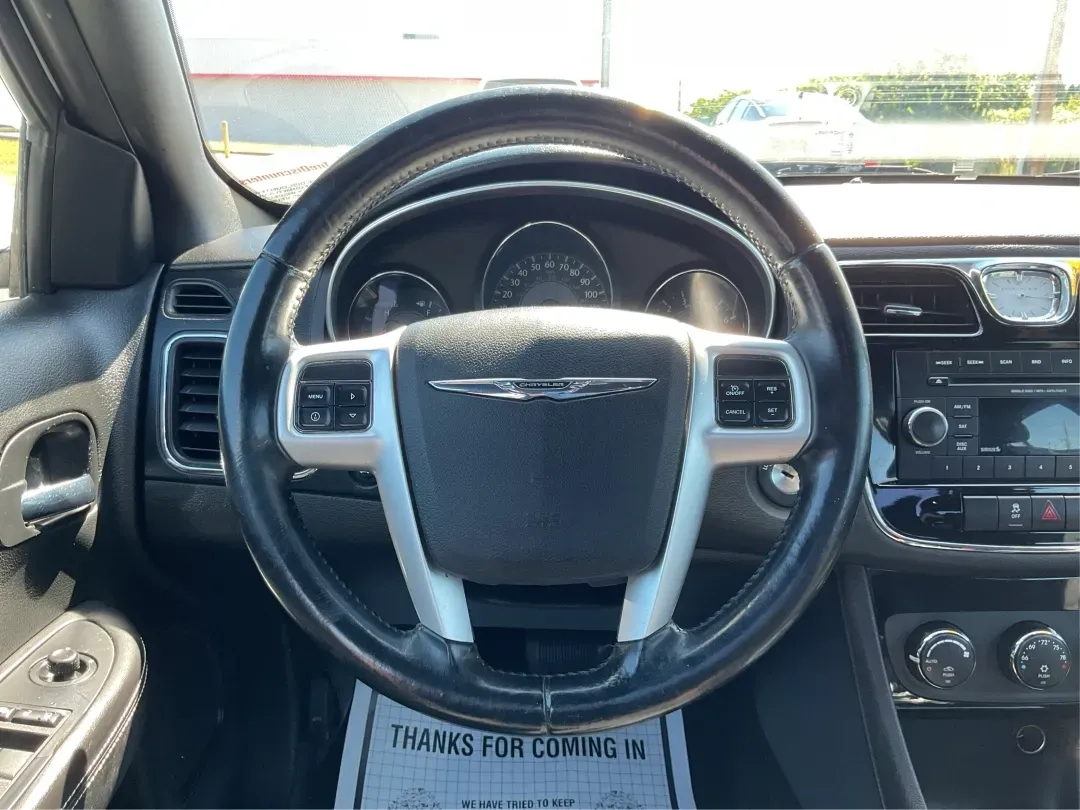 2012 Chrysler 200 Touring (1C3CCBBG4CN) with an Other engine, located at 1099 N County Rd 25A, Troy, OH, 45373, (937) 908-9800, 40.057079, -84.212883 - Unleash your driving potential with the perfect blend of style, comfort, and functionality-ideal for growing families or anyone seeking a reliable commuter vehicle. Introducing the 2012 Chrysler 200 Touring sedan, now available at Advantage Car and Credit in Troy, OH. Located at 1099 N County Rd 25A - Photo#16