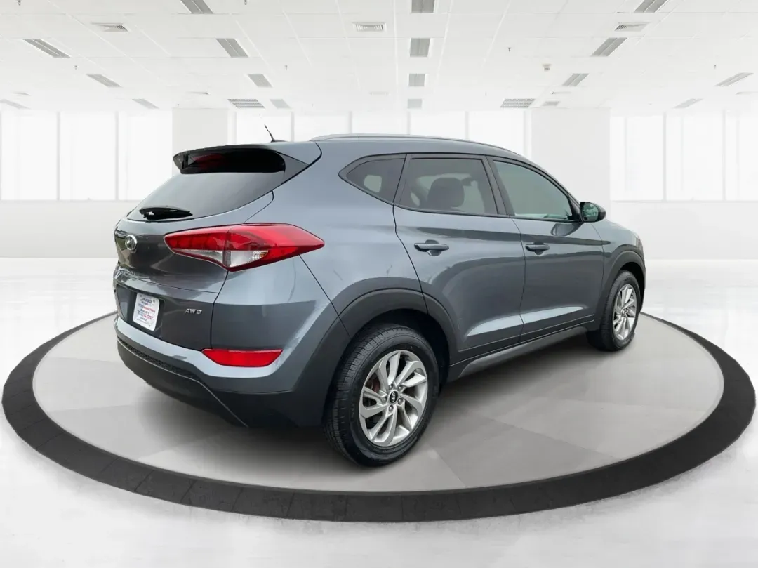 2016 Hyundai Tucson SE (KM8J3CA43GU) with an Nu 2L I-4 gasoline direct injection engine, 6A transmission, located at 1099 N County Rd 25A, Troy, OH, 45373, (937) 908-9800, 40.057079, -84.212883 - 2016 Hyundai Tucson SE - Photo#2