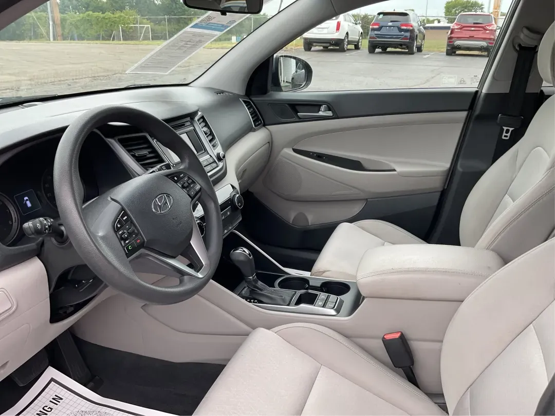 2016 Hyundai Tucson SE (KM8J3CA43GU) with an Nu 2L I-4 gasoline direct injection engine, 6A transmission, located at 1099 N County Rd 25A, Troy, OH, 45373, (937) 908-9800, 40.057079, -84.212883 - 2016 Hyundai Tucson SE - Photo#9