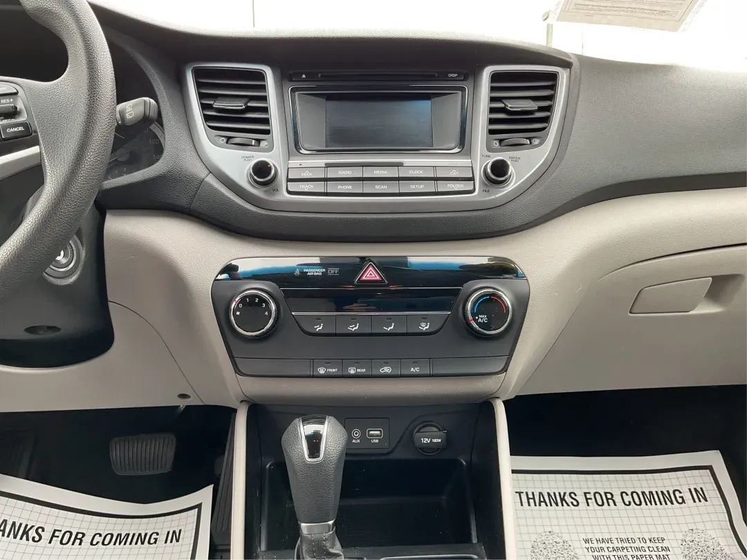 2016 Hyundai Tucson SE (KM8J3CA43GU) with an Nu 2L I-4 gasoline direct injection engine, 6A transmission, located at 1099 N County Rd 25A, Troy, OH, 45373, (937) 908-9800, 40.057079, -84.212883 - 2016 Hyundai Tucson SE - Photo#13