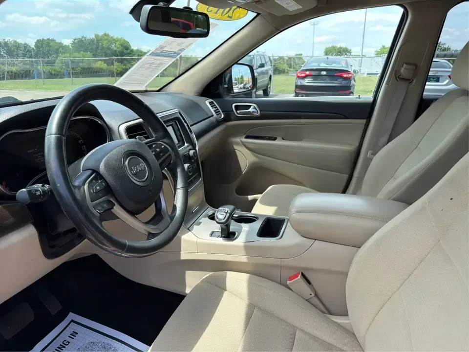 2015 Jeep Grand Cherokee Laredo (1C4RJFAG3FC) with an 3.6L V6 engine, 8-speed automatic transmission, located at 401 Woodman Dr, Riverside, OH, 45431, (937) 908-9800, 39.760899, -84.123421 - Picture the next Ohio weekend: you load up the family, point the hood toward the bike paths around Eastwood MetroPark, and let a confident 4WD SUV handle whatever the forecast throws at I-70, Route 35, or the back roads near Wright-Patterson Air Force Base. This 2015 Jeep Grand Cherokee Laredo in De- Photo#9