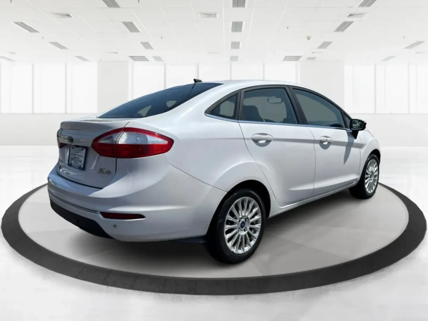 2016 Ford Fiesta Titanium (3FADP4CJ9GM) with an 1.6L I-4 DOHC engine, located at 880 E. National Road, Vandalia, OH, 45377, (937) 908-9800, 39.891918, -84.183594 - **Experience the Ultimate in Style and Comfort with the 2016 Ford Fiesta Titanium Sedan!**<br /> <br /> Are you looking for a stylish yet practical vehicle that fits seamlessly into your daily life? The 2016 Ford Fiesta Titanium Sedan is designed for those who crave sophistication without sacrificin - Photo#2