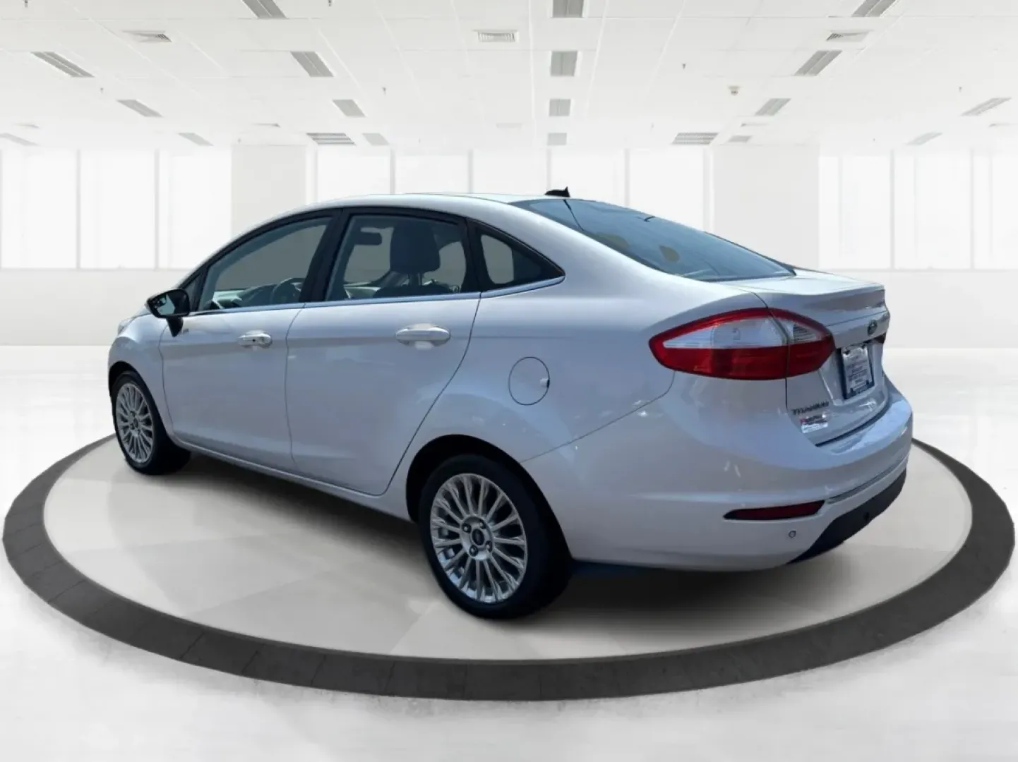2016 Ford Fiesta Titanium (3FADP4CJ9GM) with an 1.6L I-4 DOHC engine, located at 880 E. National Road, Vandalia, OH, 45377, (937) 908-9800, 39.891918, -84.183594 - **Experience the Ultimate in Style and Comfort with the 2016 Ford Fiesta Titanium Sedan!**<br /> <br /> Are you looking for a stylish yet practical vehicle that fits seamlessly into your daily life? The 2016 Ford Fiesta Titanium Sedan is designed for those who crave sophistication without sacrificin - Photo#4
