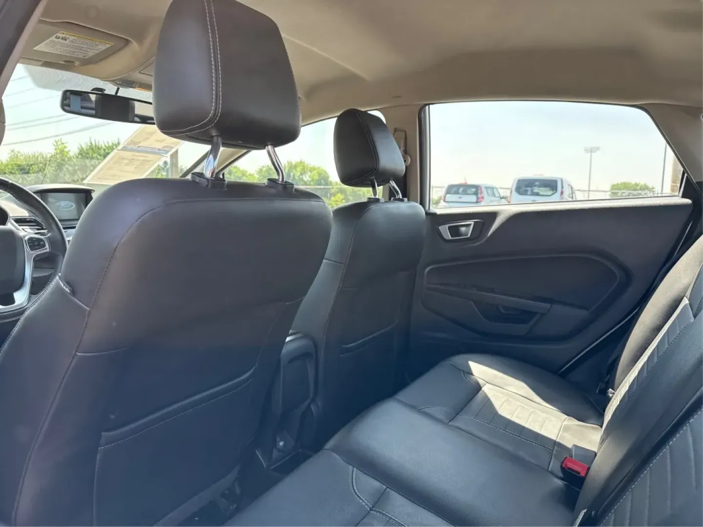 2016 Ford Fiesta Titanium (3FADP4CJ9GM) with an 1.6L I-4 DOHC engine, located at 880 E. National Road, Vandalia, OH, 45377, (937) 908-9800, 39.891918, -84.183594 - **Experience the Ultimate in Style and Comfort with the 2016 Ford Fiesta Titanium Sedan!**<br /> <br /> Are you looking for a stylish yet practical vehicle that fits seamlessly into your daily life? The 2016 Ford Fiesta Titanium Sedan is designed for those who crave sophistication without sacrificin - Photo#10