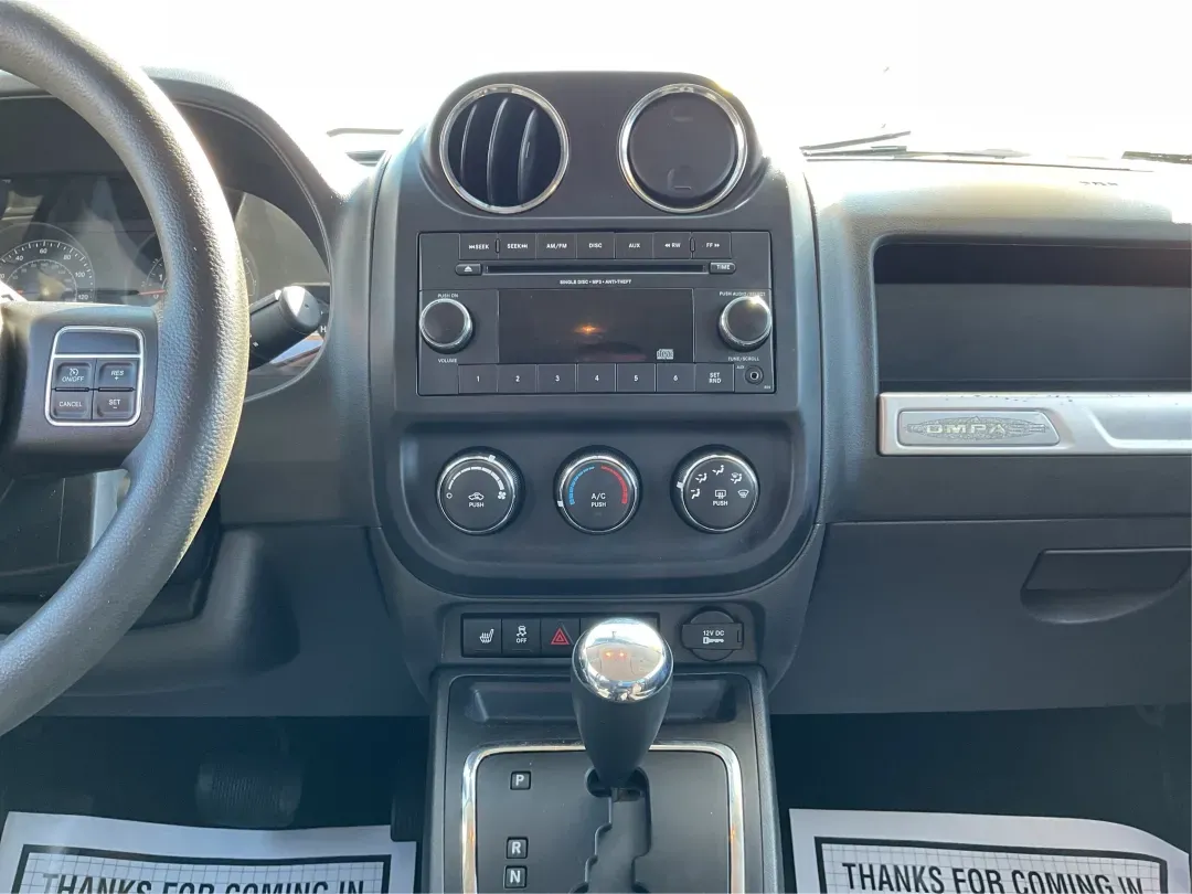 2015 Jeep Compass Altitude Edition (1C4NJCBA6FD) with an 2L I-4 DOHC engine, Continuously Variable Transmission (CVT) transmission, located at 880 E. National Road, Vandalia, OH, 45377, (937) 908-9800, 39.891918, -84.183594 - **Adventure Awaits in the 2015 Jeep Compass Altitude Edition at Advantage Car and Credit - Fairborn!**<br /> <br /> Are you ready for your next adventure? The 2015 Jeep Compass Altitude Edition is your perfect companion for weekend getaways, family road trips, or even your daily commute! This versat - Photo#13