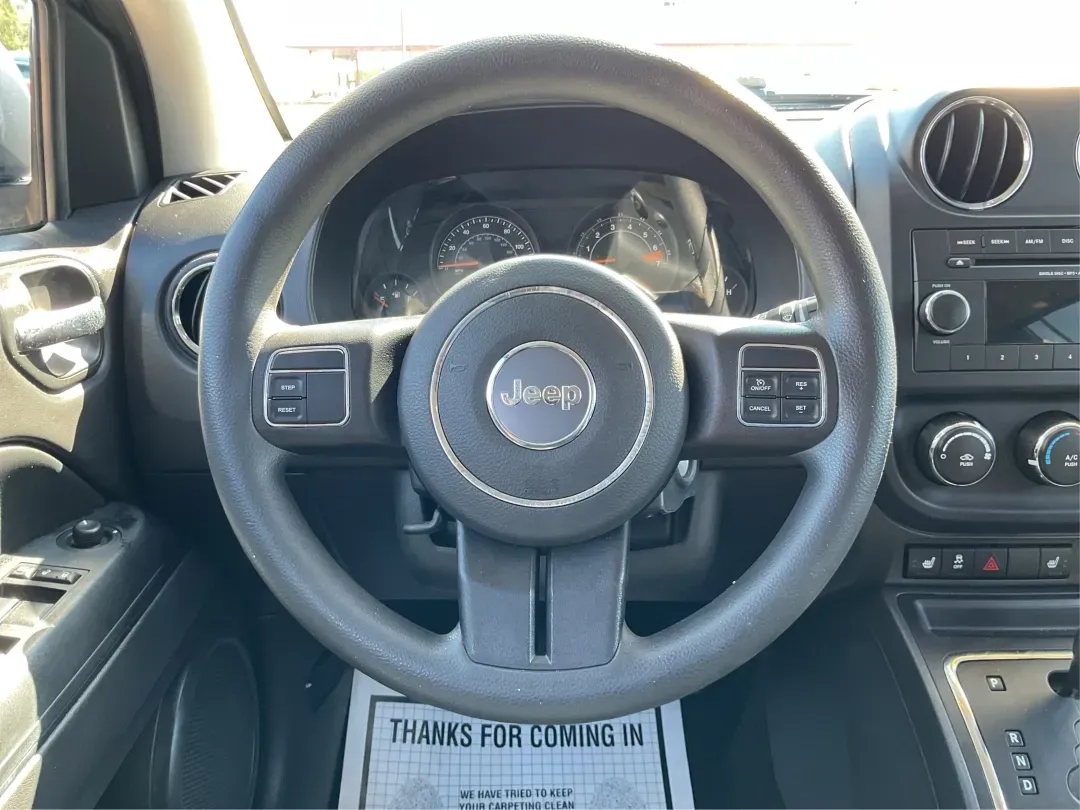 2015 Jeep Compass Altitude Edition (1C4NJCBA6FD) with an 2L I-4 DOHC engine, Continuously Variable Transmission (CVT) transmission, located at 880 E. National Road, Vandalia, OH, 45377, (937) 908-9800, 39.891918, -84.183594 - **Adventure Awaits in the 2015 Jeep Compass Altitude Edition at Advantage Car and Credit - Fairborn!**<br /> <br /> Are you ready for your next adventure? The 2015 Jeep Compass Altitude Edition is your perfect companion for weekend getaways, family road trips, or even your daily commute! This versat - Photo#16
