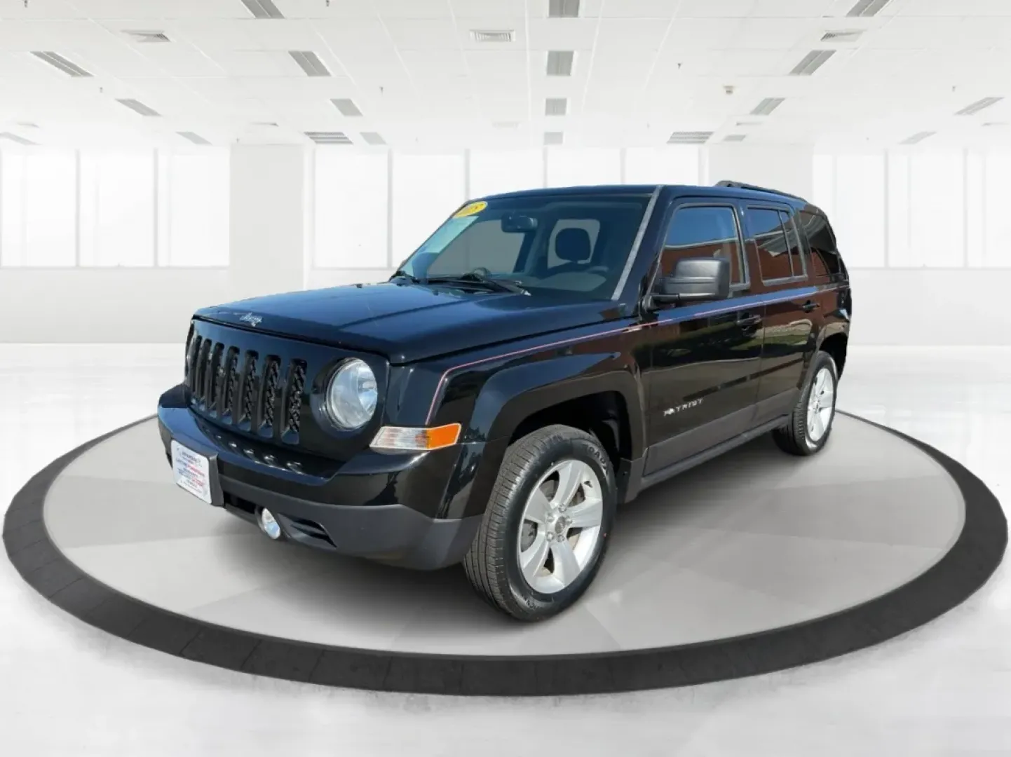 2015 Jeep Patriot Latitude (1C4NJRFB6FD) with an 2.4L I-4 DOHC engine, located at 1099 N County Rd 25A, Troy, OH, 45373, (937) 908-9800, 40.057079, -84.212883 - Discover the freedom of adventure with this 2015 Jeep Patriot Latitude, perfect for those who crave weekend getaways or family outings. With ample space and rugged capabilities, this SUV is designed for both urban commuting and off-road excursions. Whether you're navigating Troy's scenic backroads o - Photo#8