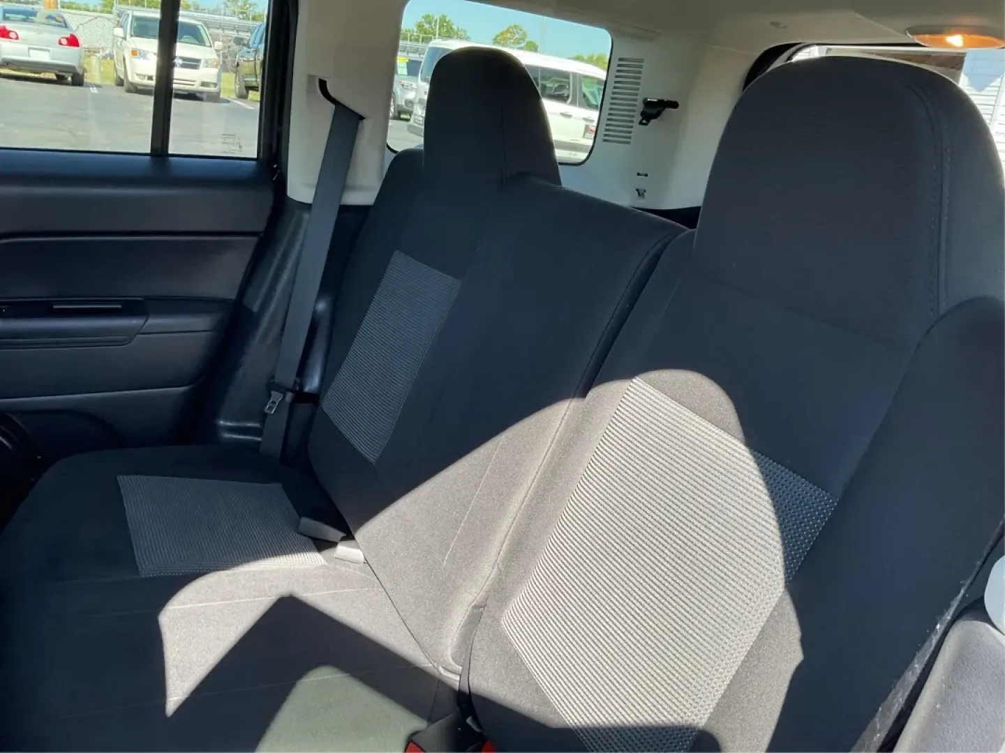 2015 Jeep Patriot Latitude (1C4NJRFB6FD) with an 2.4L I-4 DOHC engine, located at 1099 N County Rd 25A, Troy, OH, 45373, (937) 908-9800, 40.057079, -84.212883 - Discover the freedom of adventure with this 2015 Jeep Patriot Latitude, perfect for those who crave weekend getaways or family outings. With ample space and rugged capabilities, this SUV is designed for both urban commuting and off-road excursions. Whether you're navigating Troy's scenic backroads o - Photo#10