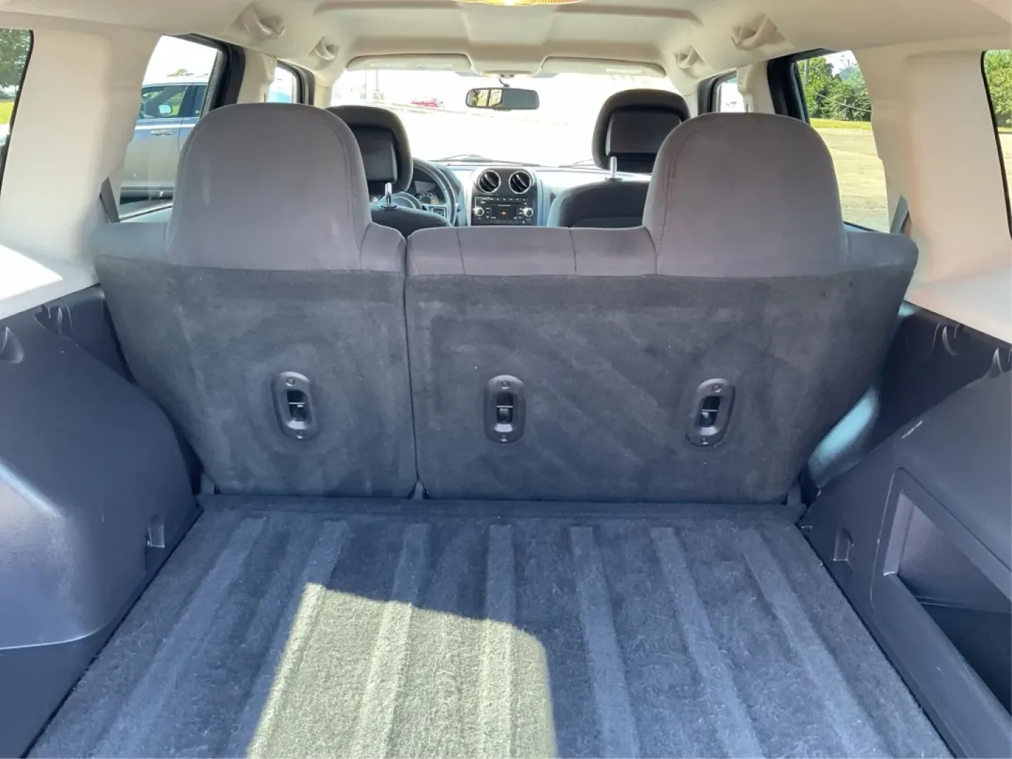 2015 Jeep Patriot Latitude (1C4NJRFB6FD) with an 2.4L I-4 DOHC engine, located at 1099 N County Rd 25A, Troy, OH, 45373, (937) 908-9800, 40.057079, -84.212883 - Discover the freedom of adventure with this 2015 Jeep Patriot Latitude, perfect for those who crave weekend getaways or family outings. With ample space and rugged capabilities, this SUV is designed for both urban commuting and off-road excursions. Whether you're navigating Troy's scenic backroads o - Photo#12