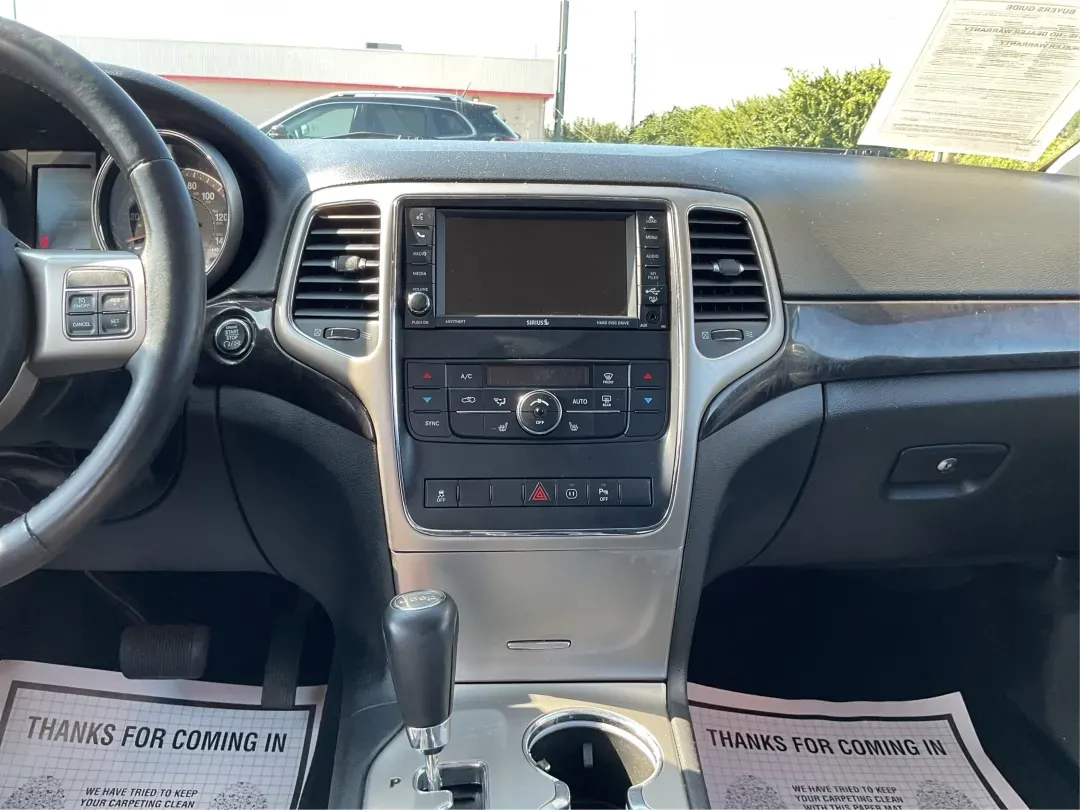 2012 Jeep Grand Cherokee Laredo (1C4RJFAG8CC) with an Other engine, located at 8750 N County Rd 25A, Piqua, OH, 45356, (937) 908-9800, 40.164391, -84.232513 - **Adventure Awaits with the 2012 Jeep Grand Cherokee Laredo Perfect for Your Next Journey!**<br /> <br /> Are you ready to upgrade your driving experience while embracing the adventurous lifestyle that comes with owning an SUV? The 2012 Jeep Grand Cherokee Laredo is the epitome of versatility, desi - Photo#13