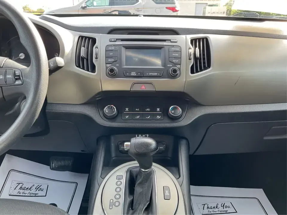 2015 Kia Sportage LX (KNDPBCAC2F7) with an 2.4L V6 DOHC 24V engine, 6-Speed Automatic transmission, located at 880 E. National Road, Vandalia, OH, 45377, (937) 908-9800, 39.891918, -84.183594 - Are you ready to elevate your driving experience and embark on unforgettable adventures? Look no further than this 2015 Kia Sportage LX, perfect for those who crave a reliable crossover that blends style with versatility. Whether you're commuting to work, shuttling the kids to school, or planning a - Photo#13