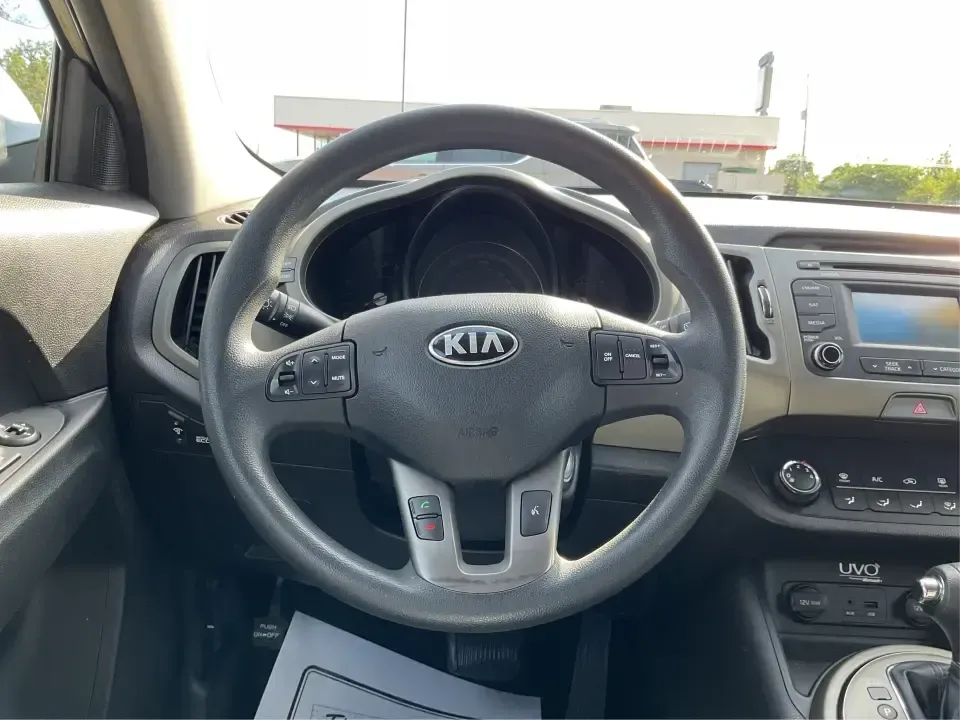 2015 Kia Sportage LX (KNDPBCAC2F7) with an 2.4L V6 DOHC 24V engine, 6-Speed Automatic transmission, located at 880 E. National Road, Vandalia, OH, 45377, (937) 908-9800, 39.891918, -84.183594 - Are you ready to elevate your driving experience and embark on unforgettable adventures? Look no further than this 2015 Kia Sportage LX, perfect for those who crave a reliable crossover that blends style with versatility. Whether you're commuting to work, shuttling the kids to school, or planning a - Photo#16