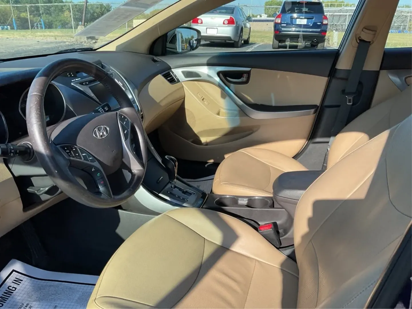 2013 Hyundai Elantra Limited (5NPDH4AEXDH) with an 1.8L I-4 DOHC engine, located at 8750 N County Rd 25A, Piqua, OH, 45356, (937) 908-9800, 40.164391, -84.232513 - **Experience the Perfect Blend of Comfort and Style with the 2013 Hyundai Elantra at Advantage Car and Credit - Piqua!**<br /> <br /> Are you searching for a reliable sedan that perfectly balances style, comfort, and affordability? The 2013 Hyundai Elantra is your ideal companion, whether you're com - Photo#9