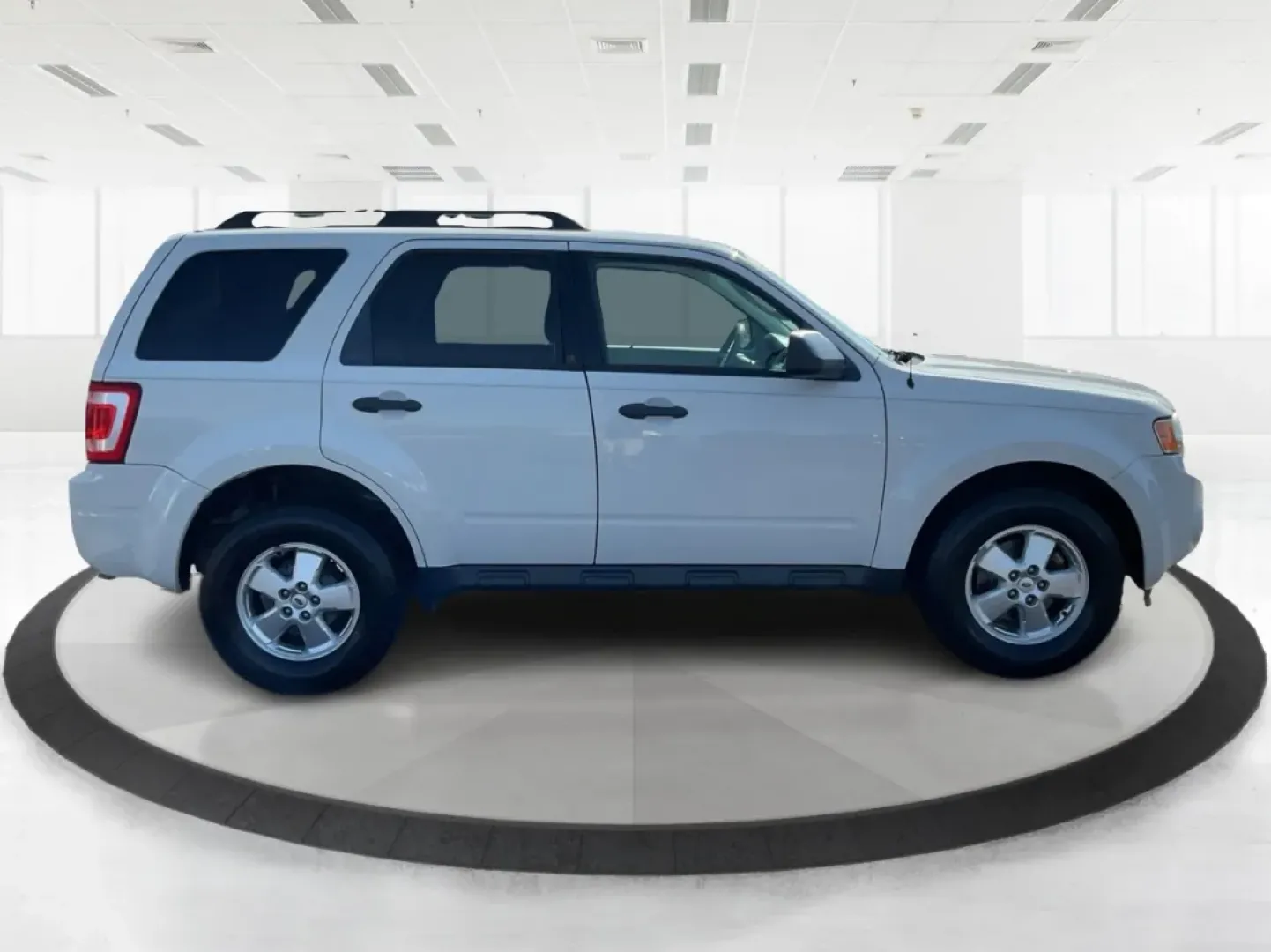 2012 Ford Escape XLT (1FMCU9D7XCK) with an Other engine, located at 1099 N County Rd 25A, Troy, OH, 45373, (937) 908-9800, 40.057079, -84.212883 - Discover the perfect balance of comfort and capability with the 2012 Ford Escape XLT, now available at Advantage Car and Credit - Troy. If you're seeking a versatile SUV that accommodates the demands of everyday life-from school runs to weekend adventures-this vehicle is tailored for you. With its r - Photo#1