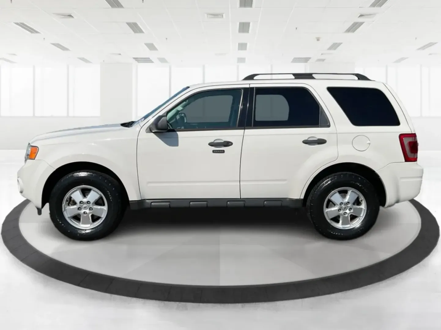 2012 Ford Escape XLT (1FMCU9D7XCK) with an Other engine, located at 1099 N County Rd 25A, Troy, OH, 45373, (937) 908-9800, 40.057079, -84.212883 - Discover the perfect balance of comfort and capability with the 2012 Ford Escape XLT, now available at Advantage Car and Credit - Troy. If you're seeking a versatile SUV that accommodates the demands of everyday life-from school runs to weekend adventures-this vehicle is tailored for you. With its r - Photo#5