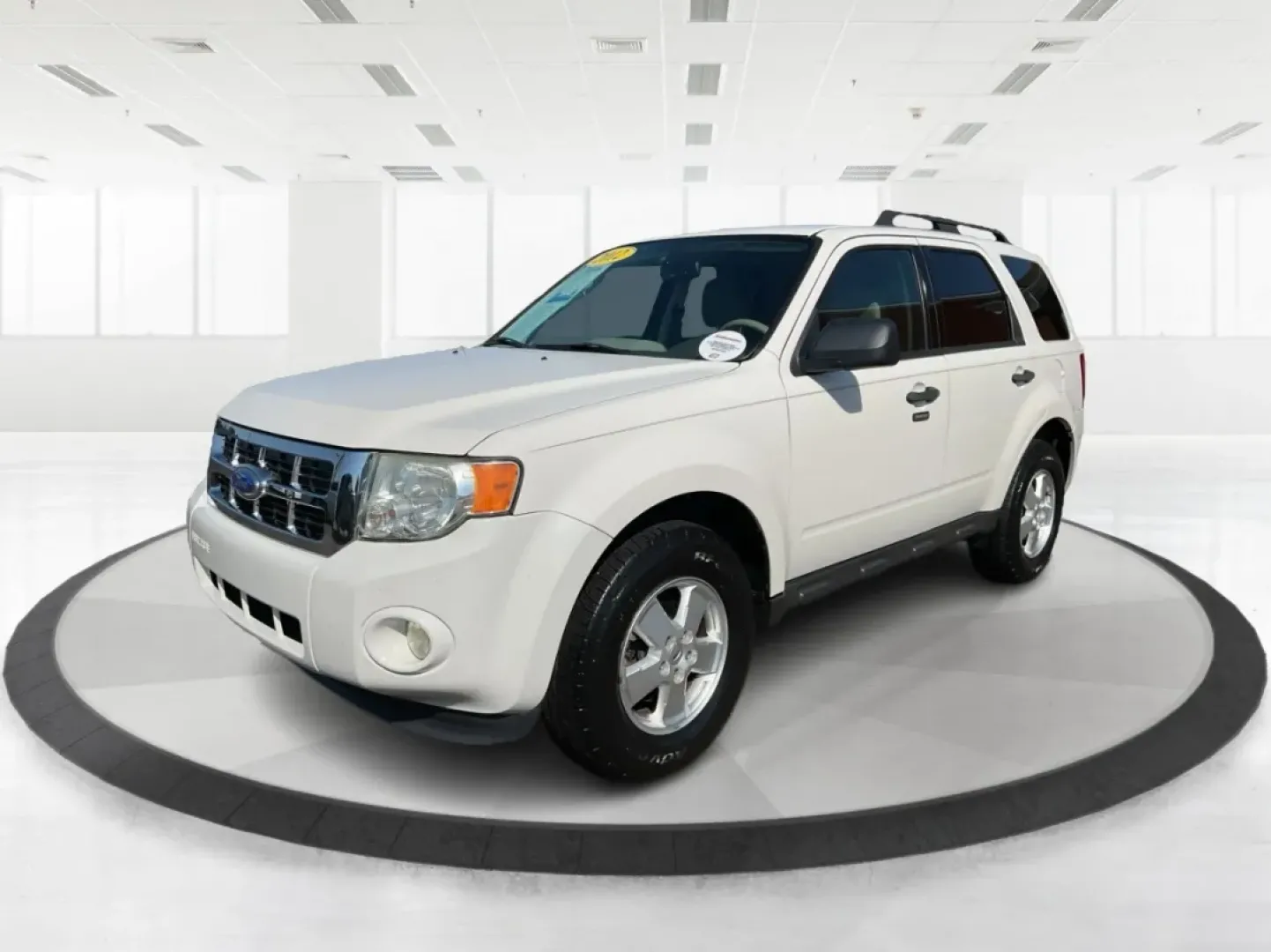 2012 Ford Escape XLT (1FMCU9D7XCK) with an Other engine, located at 1099 N County Rd 25A, Troy, OH, 45373, (937) 908-9800, 40.057079, -84.212883 - Discover the perfect balance of comfort and capability with the 2012 Ford Escape XLT, now available at Advantage Car and Credit - Troy. If you're seeking a versatile SUV that accommodates the demands of everyday life-from school runs to weekend adventures-this vehicle is tailored for you. With its r - Photo#8