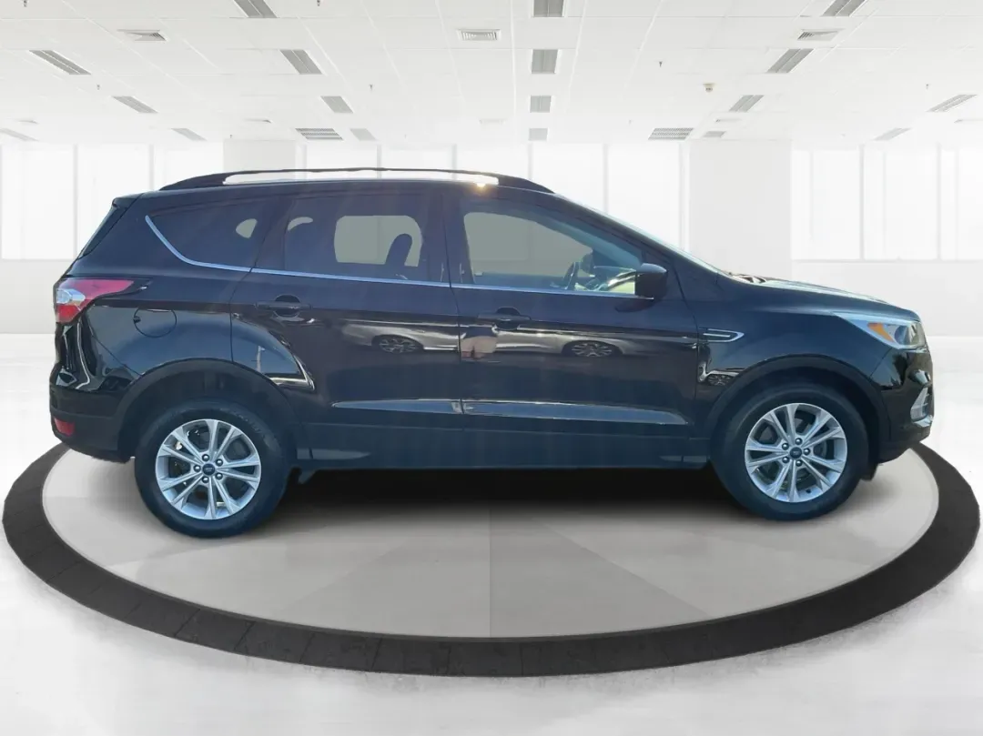 2018 Ford Escape SE (1FMCU0GD6JU) with an Other engine, located at 1184 Kauffman Ave, Fairborn, OH, 45324, (937) 908-9800, 39.807072, -84.030914 - Experience adventure and comfort on the open road with the 2018 Ford Escape SE, available now at Advantage Car and Credit in Vandalia, OH. This versatile SUV is perfect for families, outdoor enthusiasts, and commuters alike, providing a seamless blend of style, safety, and functionality. With plenty - Photo#1