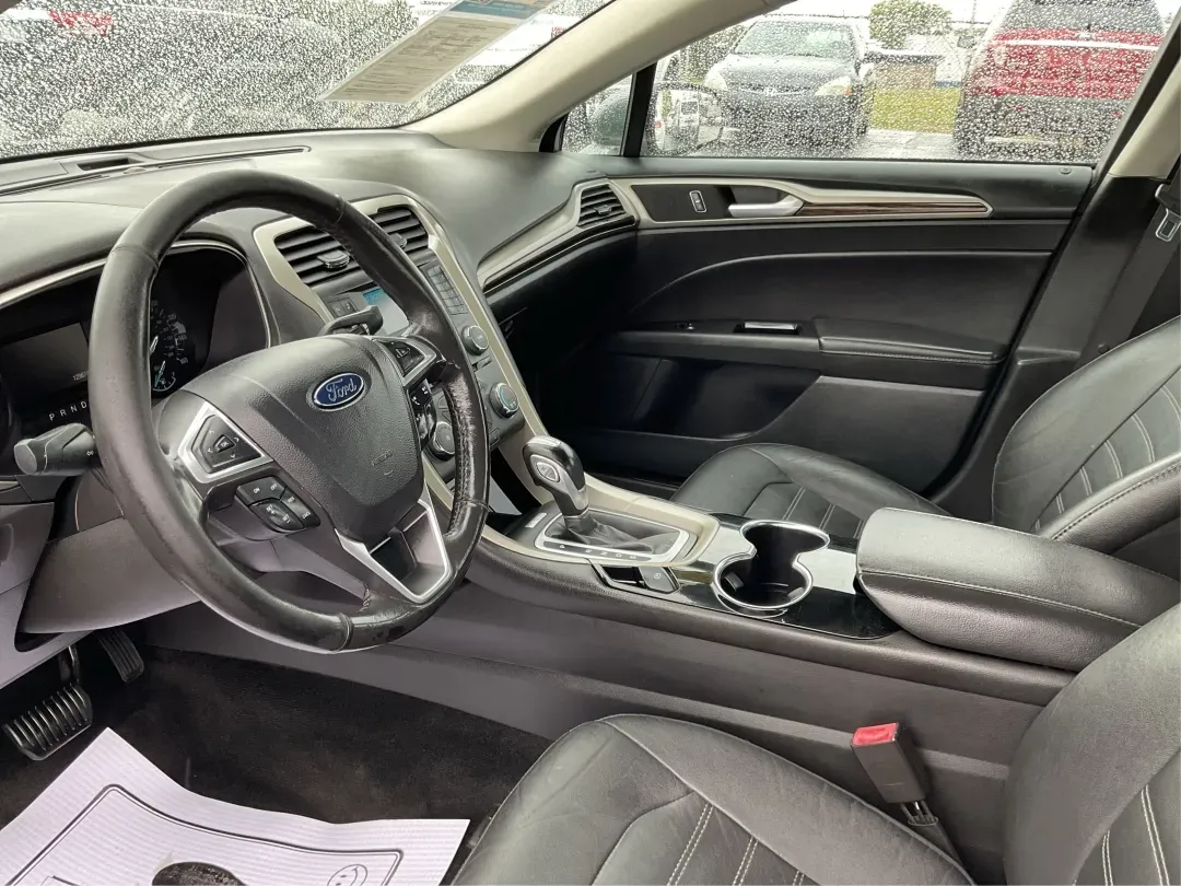 2014 Ford Fusion SE (3FA6P0HD2ER) with an Other engine, located at 1099 N County Rd 25A, Troy, OH, 45373, (937) 908-9800, 40.057079, -84.212883 - **Discover Your Next Adventure with the 2014 Ford Fusion SE at Advantage Car and Credit - Moraine** <br /> <br /> Are you ready to elevate your daily commute or family road trips? The 2014 Ford Fusion SE is your gateway to a lifestyle brimming with comfort, technology, and reliability. Ideal for bu - Photo#9