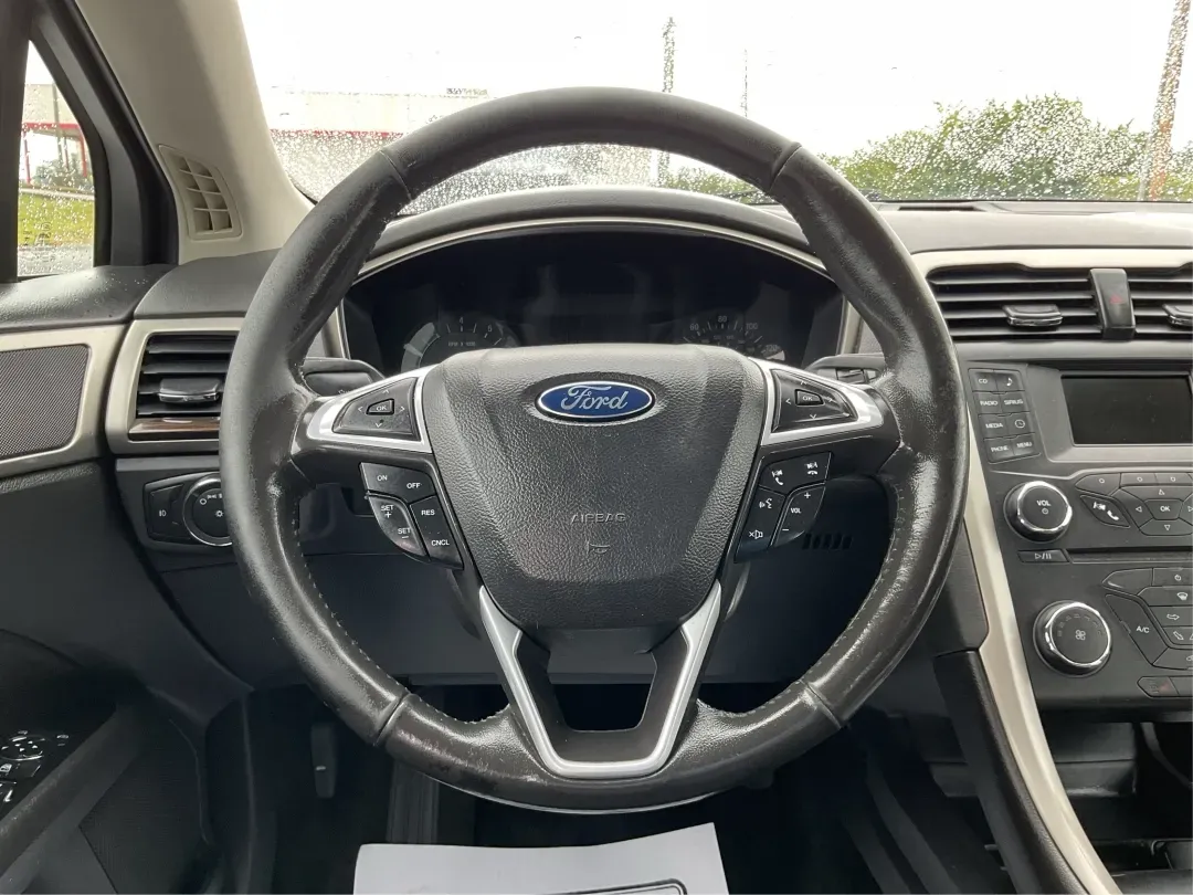 2014 Ford Fusion SE (3FA6P0HD2ER) with an Other engine, located at 1099 N County Rd 25A, Troy, OH, 45373, (937) 908-9800, 40.057079, -84.212883 - **Discover Your Next Adventure with the 2014 Ford Fusion SE at Advantage Car and Credit - Moraine** <br /> <br /> Are you ready to elevate your daily commute or family road trips? The 2014 Ford Fusion SE is your gateway to a lifestyle brimming with comfort, technology, and reliability. Ideal for bu - Photo#16