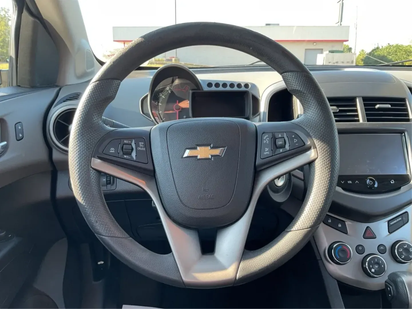 2015 Chevrolet Sonic LT Auto (1G1JC5SG4F4) with an Other engine, located at 401 Woodman Dr, Riverside, OH, 45431, (937) 908-9800, 39.760899, -84.123421 - ### Discover Your Next Adventure with this 2015 Chevrolet Sonic LT Auto!<br /> <br /> Are you searching for a reliable sedan that's perfect for your daily commute or weekend getaways? Look no further than this stunning 2015 Chevrolet Sonic LT Auto, available now at Advantage Car and Credit in Morain - Photo#16