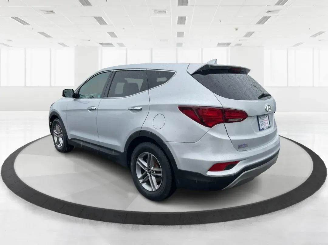 2017 Hyundai Santa Fe 2.4L (5XYZTDLB2HG) with an Theta II 2.4L I-4 gasoline direct injection engine, located at 4508 South Dixie Dr, Moraine, OH, 45439, (937) 908-9800, 39.689976, -84.218452 - Discover the perfect blend of comfort, capability, and style with the 2017 Hyundai Santa Fe, now available at Advantage Car and Credit, located at 1184 Kauffman Ave, Fairborn, OH 45324. This versatile SUV is an excellent choice for growing families, weekend adventurers, or budget-conscious buyers lo - Photo#4