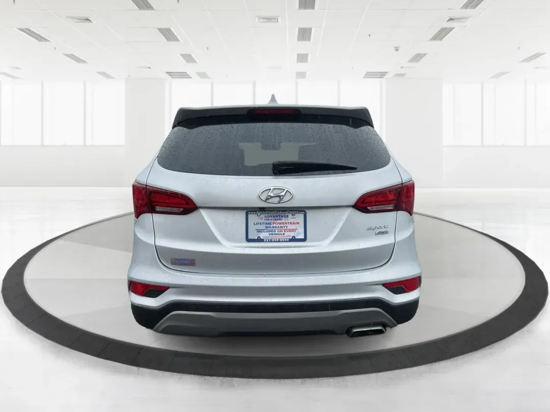 2017 Hyundai Santa Fe 2.4L (5XYZTDLB2HG) with an Theta II 2.4L I-4 gasoline direct injection engine, 6A transmission, located at 1951 S Dayton Lakeview Rd., New Carlisle, OH, 45344, (937) 908-9800, 39.890999, -84.050255 - Discover the perfect blend of comfort, capability, and style with the 2017 Hyundai Santa Fe, now available at Advantage Car and Credit, located at 1184 Kauffman Ave, Fairborn, OH 45324. This versatile SUV is an excellent choice for growing families, weekend adventurers, or budget-conscious buyers lo - Photo#3