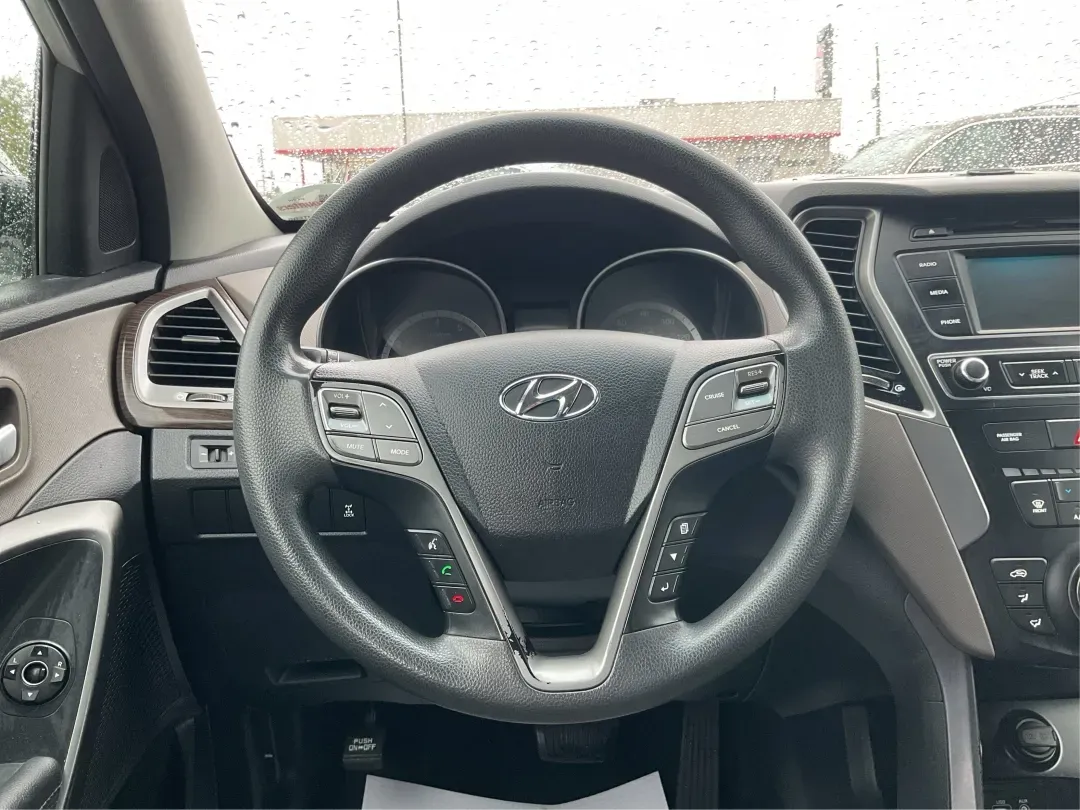 2017 Hyundai Santa Fe 2.4L (5XYZTDLB2HG) with an Theta II 2.4L I-4 gasoline direct injection engine, 6A transmission, located at 1951 S Dayton Lakeview Rd., New Carlisle, OH, 45344, (937) 908-9800, 39.890999, -84.050255 - Discover the perfect blend of comfort, capability, and style with the 2017 Hyundai Santa Fe, now available at Advantage Car and Credit, located at 1184 Kauffman Ave, Fairborn, OH 45324. This versatile SUV is an excellent choice for growing families, weekend adventurers, or budget-conscious buyers lo - Photo#16