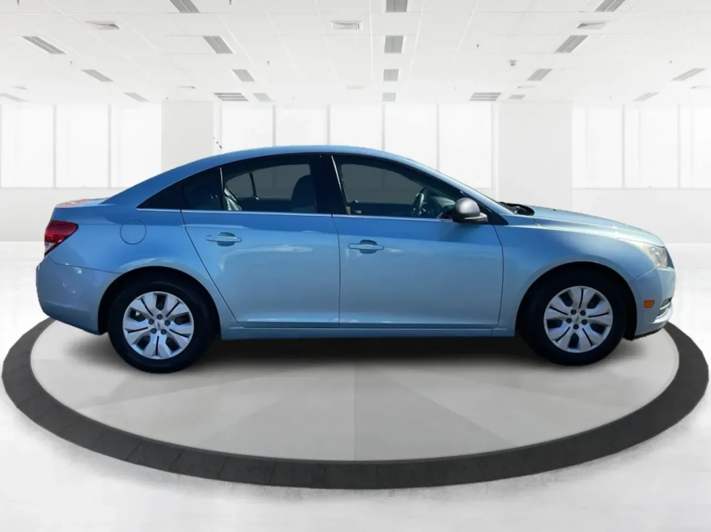2012 Chevrolet Cruze LS (1G1PC5SH0C7) with an Ecotec 1.8L I-4 DOHC engine, located at 880 E. National Road, Vandalia, OH, 45377, (937) 908-9800, 39.891918, -84.183594 - **Adventure Awaits with the 2012 Chevrolet Cruze LS in Ice Blue Metallic!**<br /> <br /> Are you ready to elevate your daily commute or embark on unforgettable road trips? The 2012 Chevrolet Cruze LS is your perfect companion for any journey, blending comfort, efficiency, and style into one sleek se - Photo#1