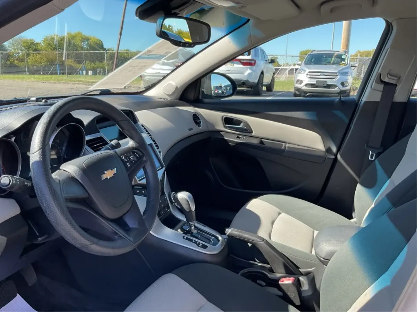 2012 Chevrolet Cruze LS (1G1PC5SH0C7) with an Ecotec 1.8L I-4 DOHC engine, located at 880 E. National Road, Vandalia, OH, 45377, (937) 908-9800, 39.891918, -84.183594 - **Adventure Awaits with the 2012 Chevrolet Cruze LS in Ice Blue Metallic!**<br /> <br /> Are you ready to elevate your daily commute or embark on unforgettable road trips? The 2012 Chevrolet Cruze LS is your perfect companion for any journey, blending comfort, efficiency, and style into one sleek se - Photo#9