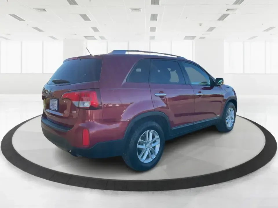 2015 Kia Sorento LX (5XYKTCA66FG) with an 2.4L I-4 gasoline direct injection engine, 6-Speed Automatic transmission, located at 4508 South Dixie Dr, Moraine, OH, 45439, (937) 908-9800, 39.689976, -84.218452 - **Adventure Awaits with the 2015 Kia Sorento LX from Advantage Car and Credit!**<br /> <br /> Are you ready to elevate your family outings or embark on unforgettable weekend adventures? Look no further than this stunning **2015 Kia Sorento LX**! With its striking Remington Red Metallic exterior and - Photo#2
