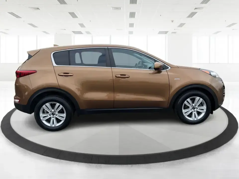 2017 Kia Sportage LX AWD (KNDPMCAC2H7) with an 2.4L V6 DOHC 24V engine, 6A transmission, located at 8750 N County Rd 25A, Piqua, OH, 45356, (937) 908-9800, 40.164391, -84.232513 - Picture a weekend that starts with soccer drop-off in Piqua, turns into a quick Costco run, and still leaves room for a sunset drive toward the Miami Valley-this 2017 Kia Sportage LX AWD is the kind of crossover that fits real-life schedules. With seating for five, confident all-wheel drive, and a v- Photo#1