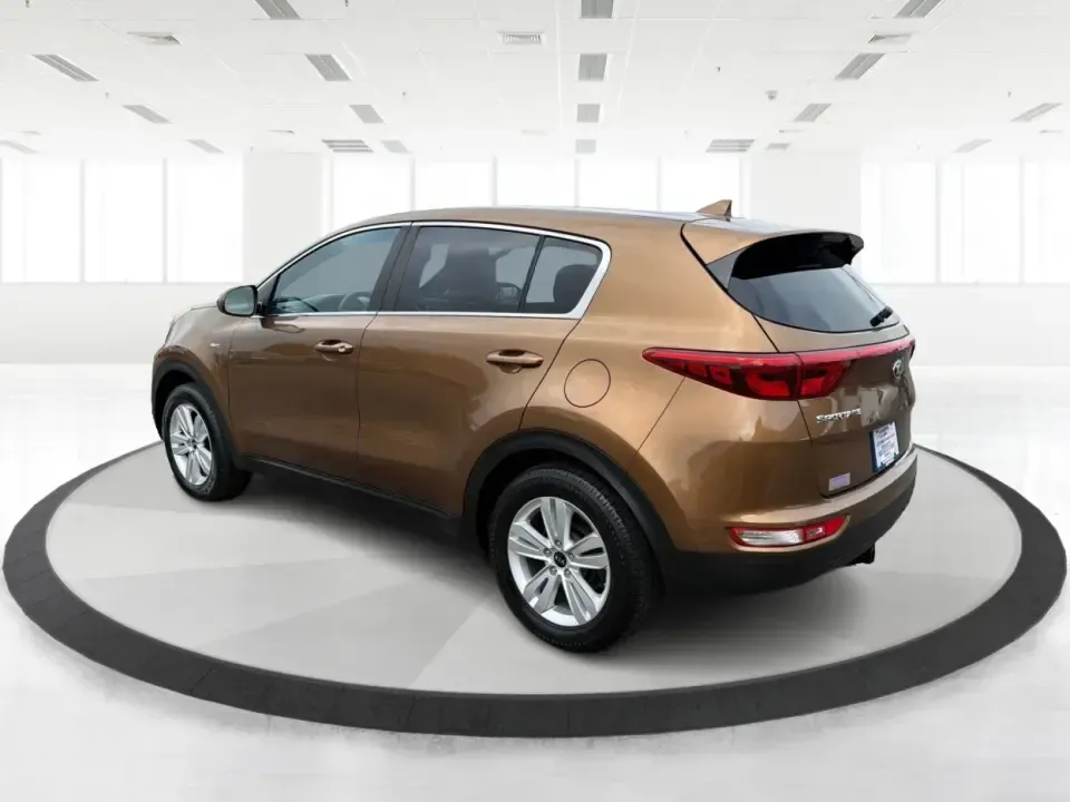 2017 Kia Sportage LX AWD (KNDPMCAC2H7) with an 2.4L V6 DOHC 24V engine, 6A transmission, located at 8750 N County Rd 25A, Piqua, OH, 45356, (937) 908-9800, 40.164391, -84.232513 - Picture a weekend that starts with soccer drop-off in Piqua, turns into a quick Costco run, and still leaves room for a sunset drive toward the Miami Valley-this 2017 Kia Sportage LX AWD is the kind of crossover that fits real-life schedules. With seating for five, confident all-wheel drive, and a v- Photo#4