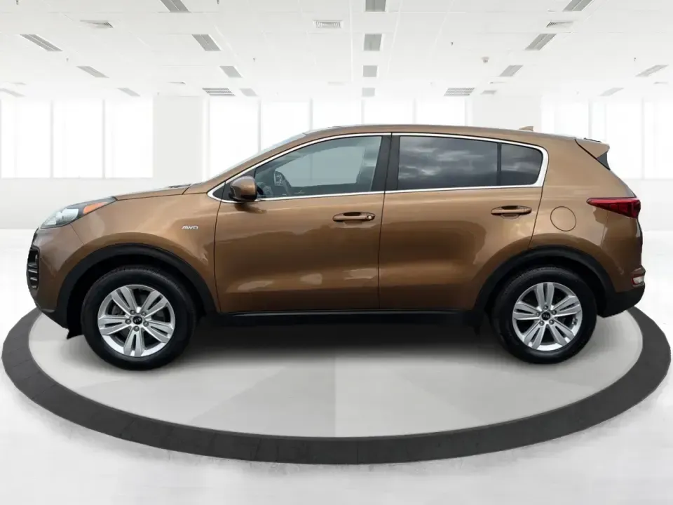 2017 Kia Sportage LX AWD (KNDPMCAC2H7) with an 2.4L V6 DOHC 24V engine, 6A transmission, located at 8750 N County Rd 25A, Piqua, OH, 45356, (937) 908-9800, 40.164391, -84.232513 - Picture a weekend that starts with soccer drop-off in Piqua, turns into a quick Costco run, and still leaves room for a sunset drive toward the Miami Valley-this 2017 Kia Sportage LX AWD is the kind of crossover that fits real-life schedules. With seating for five, confident all-wheel drive, and a v- Photo#5