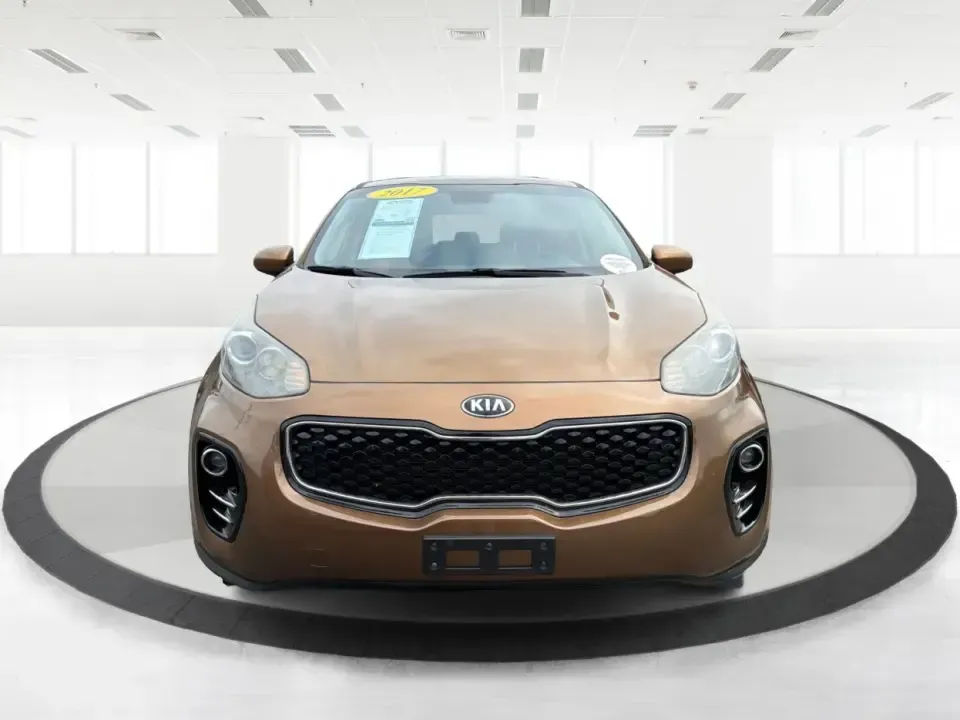 2017 Kia Sportage LX AWD (KNDPMCAC2H7) with an 2.4L V6 DOHC 24V engine, 6A transmission, located at 8750 N County Rd 25A, Piqua, OH, 45356, (937) 908-9800, 40.164391, -84.232513 - Picture a weekend that starts with soccer drop-off in Piqua, turns into a quick Costco run, and still leaves room for a sunset drive toward the Miami Valley-this 2017 Kia Sportage LX AWD is the kind of crossover that fits real-life schedules. With seating for five, confident all-wheel drive, and a v- Photo#7