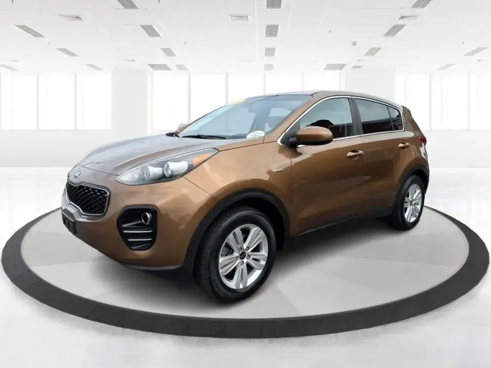2017 Kia Sportage LX AWD (KNDPMCAC2H7) with an 2.4L V6 DOHC 24V engine, 6A transmission, located at 8750 N County Rd 25A, Piqua, OH, 45356, (937) 908-9800, 40.164391, -84.232513 - Picture a weekend that starts with soccer drop-off in Piqua, turns into a quick Costco run, and still leaves room for a sunset drive toward the Miami Valley-this 2017 Kia Sportage LX AWD is the kind of crossover that fits real-life schedules. With seating for five, confident all-wheel drive, and a v- Photo#8