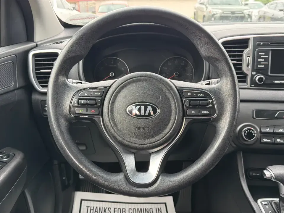 2017 Kia Sportage LX AWD (KNDPMCAC2H7) with an 2.4L V6 DOHC 24V engine, 6A transmission, located at 8750 N County Rd 25A, Piqua, OH, 45356, (937) 908-9800, 40.164391, -84.232513 - Picture a weekend that starts with soccer drop-off in Piqua, turns into a quick Costco run, and still leaves room for a sunset drive toward the Miami Valley-this 2017 Kia Sportage LX AWD is the kind of crossover that fits real-life schedules. With seating for five, confident all-wheel drive, and a v- Photo#15
