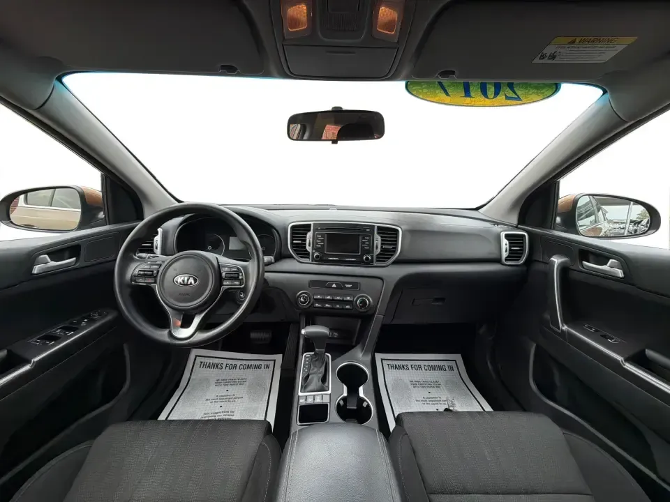 2017 Kia Sportage LX AWD (KNDPMCAC2H7) with an 2.4L V6 DOHC 24V engine, 6A transmission, located at 8750 N County Rd 25A, Piqua, OH, 45356, (937) 908-9800, 40.164391, -84.232513 - Picture a weekend that starts with soccer drop-off in Piqua, turns into a quick Costco run, and still leaves room for a sunset drive toward the Miami Valley-this 2017 Kia Sportage LX AWD is the kind of crossover that fits real-life schedules. With seating for five, confident all-wheel drive, and a v- Photo#18
