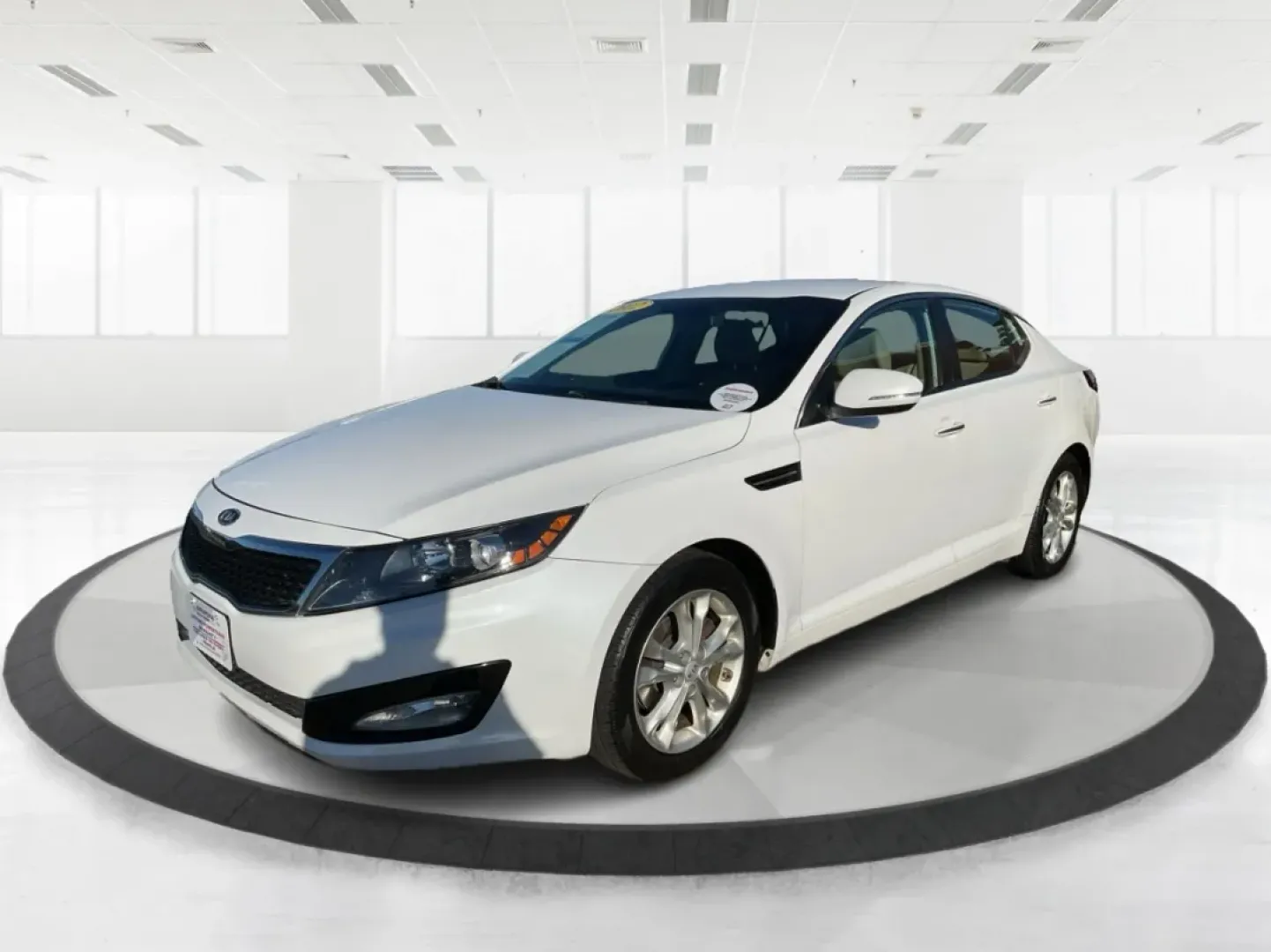 2012 Kia Optima EX (5XXGN4A70CG) with an 2.4L I-4 gasoline direct injection engine, located at 1099 N County Rd 25A, Troy, OH, 45373, (937) 908-9800, 40.057079, -84.212883 - Elevate your driving experience with this stunning 2012 Kia Optima EX, a perfect blend of style, comfort, and reliability. Ideal for budget-conscious buyers and growing families alike, this sedan is designed to meet your daily commuting needs while offering the space and features essential for both - Photo#8
